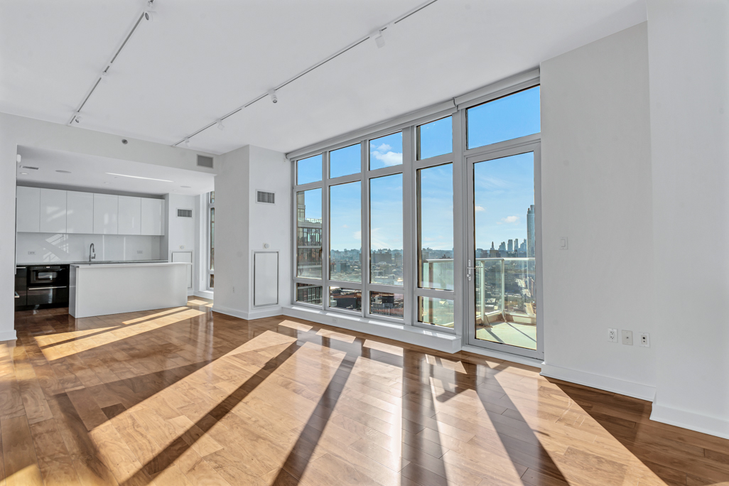 2 Northside Piers, Unit PH2 Brooklyn, NY 11249 - Photo 5 of 27 a view of an empty room and window
