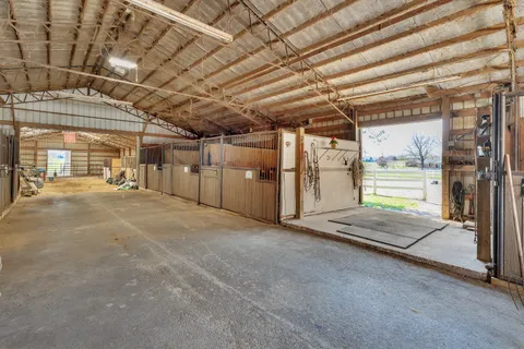 a view of a room with wooden walls