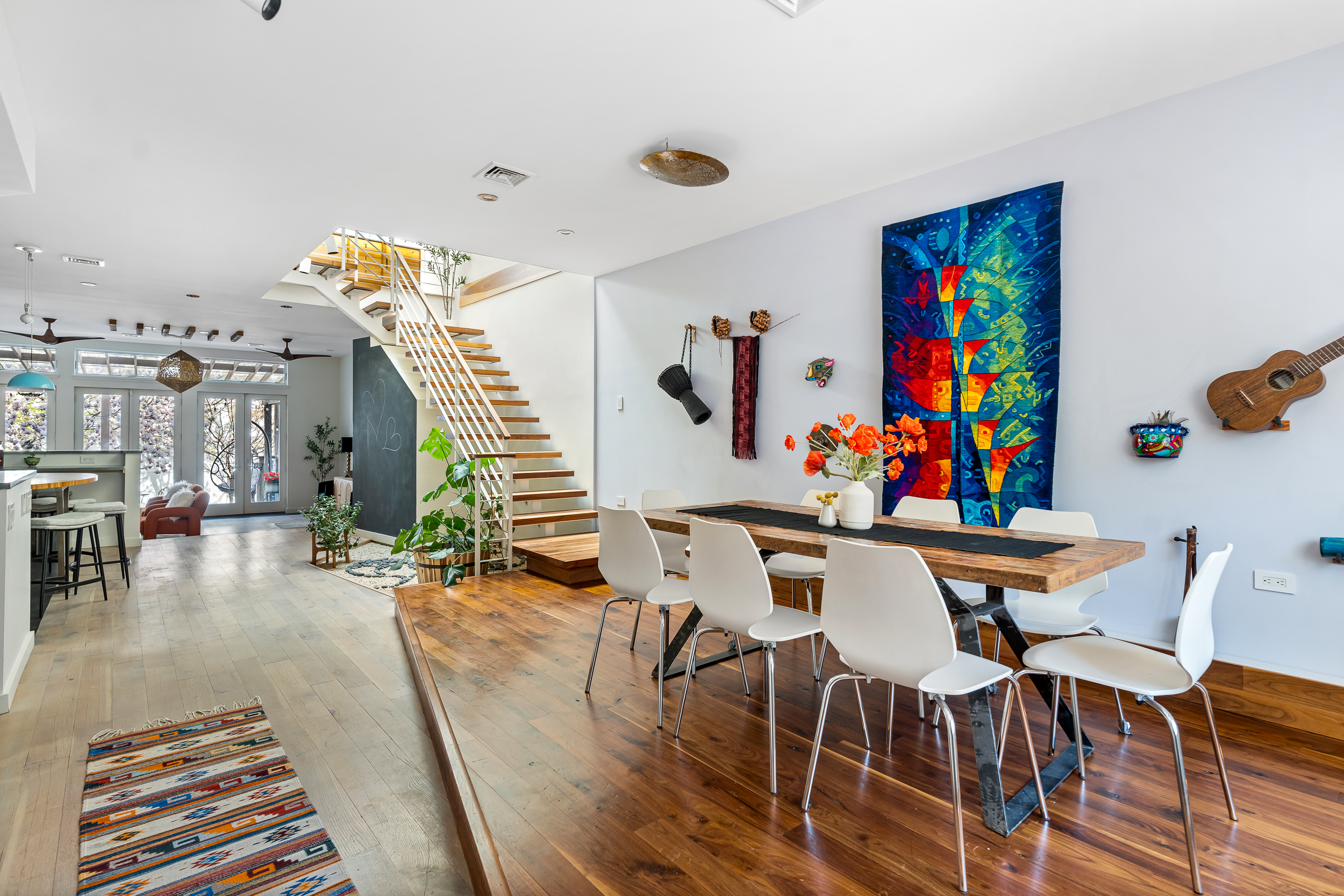 65 Jackson Street Brooklyn, NY 11211 - Photo 5 of 36 a view of a dining room with furniture and wooden floor
