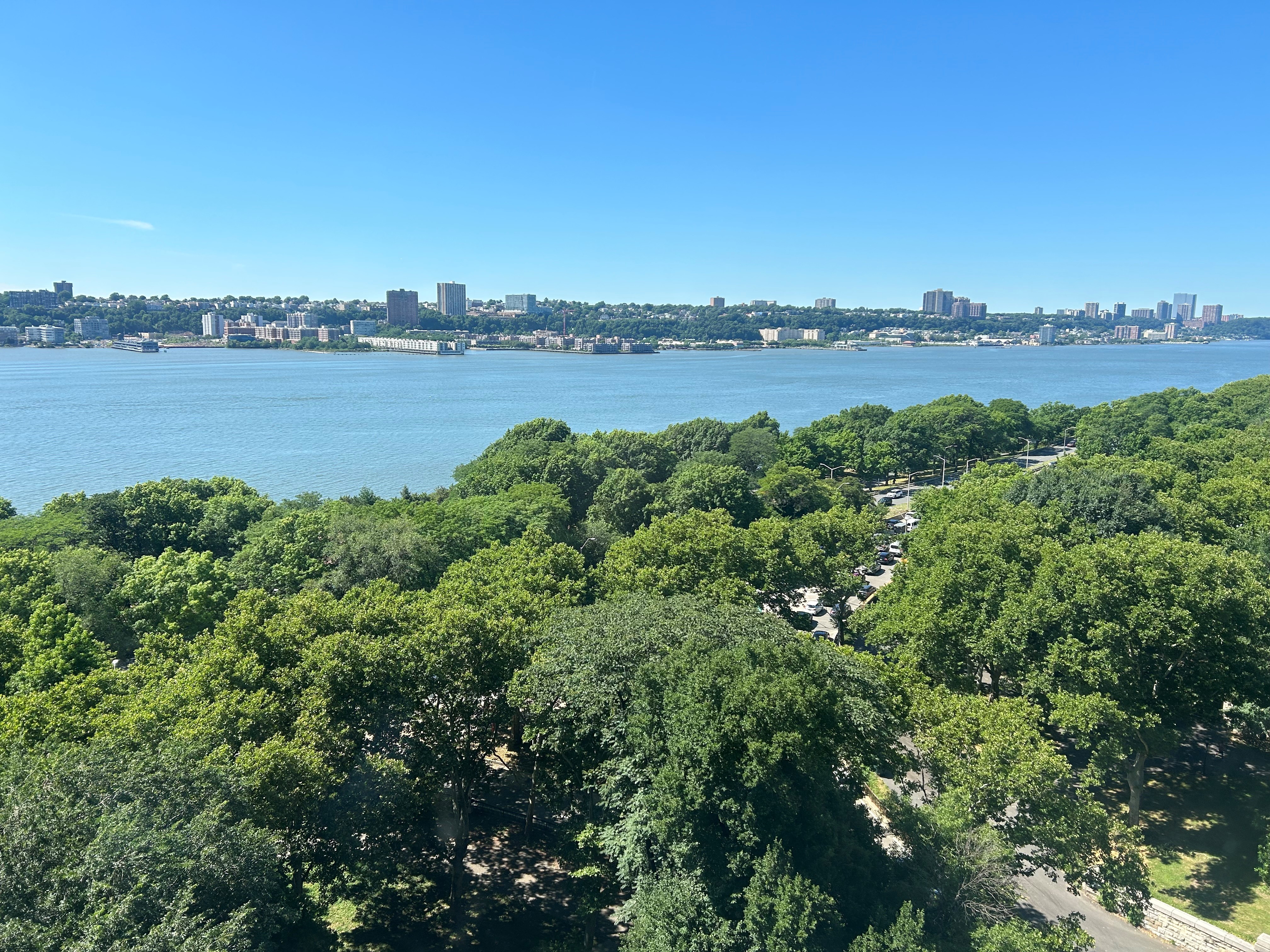 230 Riverside Drive, Unit 14AC Manhattan, NY 10025 - Photo 2 of 30 a view of a city and lake