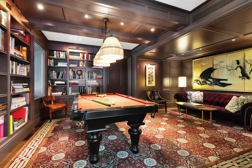 530 Park Avenue, Unit 12F Manhattan, NY 10065 - Photo 22 of 26 a room with furniture pool table and flat screen tv