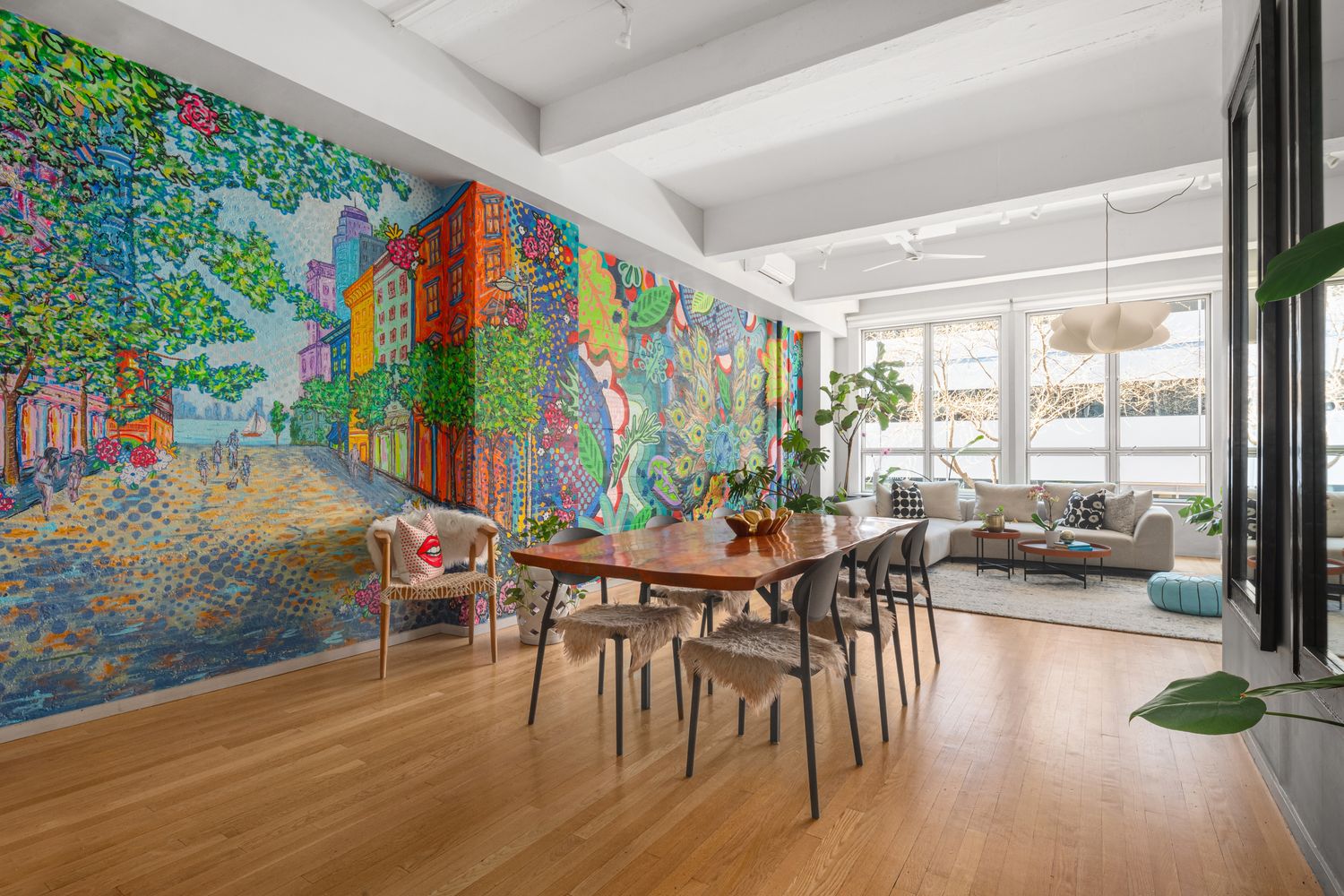 a outdoor dining space with furniture and wooden floor