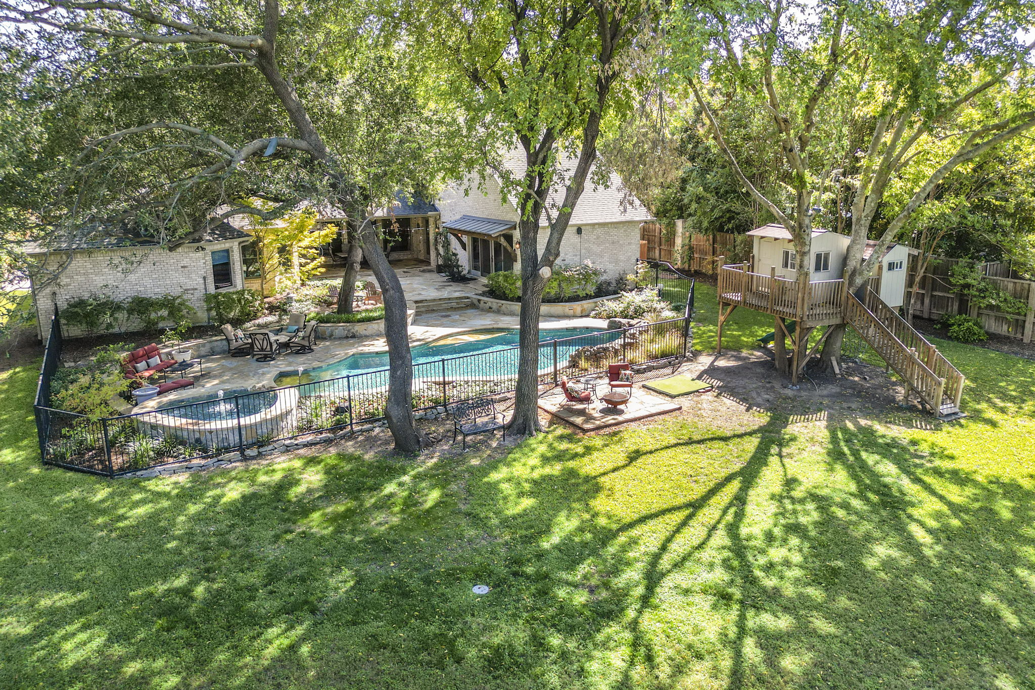 11503 West Ricks Circle Dallas, TX 75230 - Photo 2 of 39 a view of a park with large trees