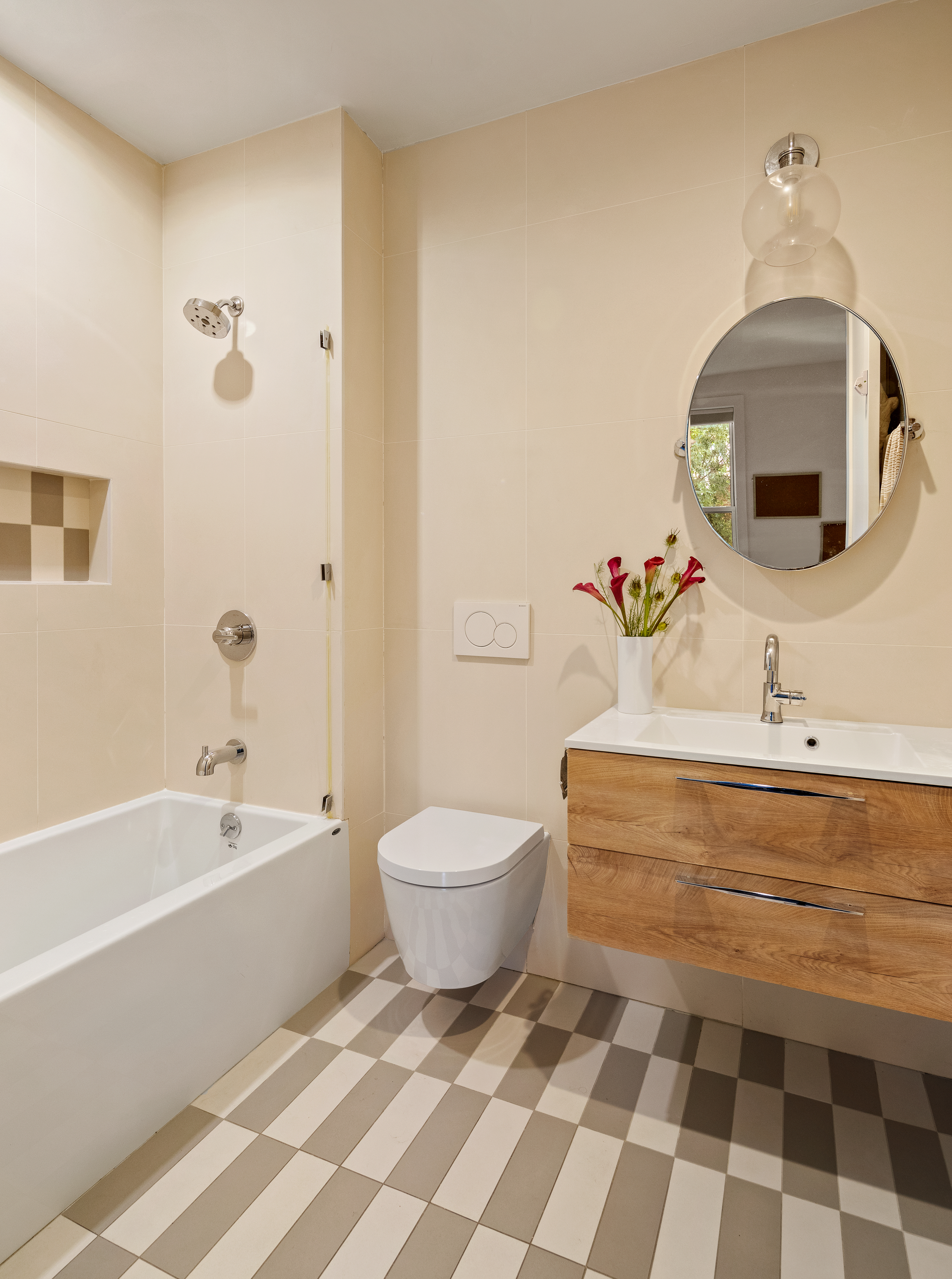 197 Madison Street Brooklyn, NY 11216 - Photo 13 of 19 a bathroom with a sink toilet a mirror and bathtub