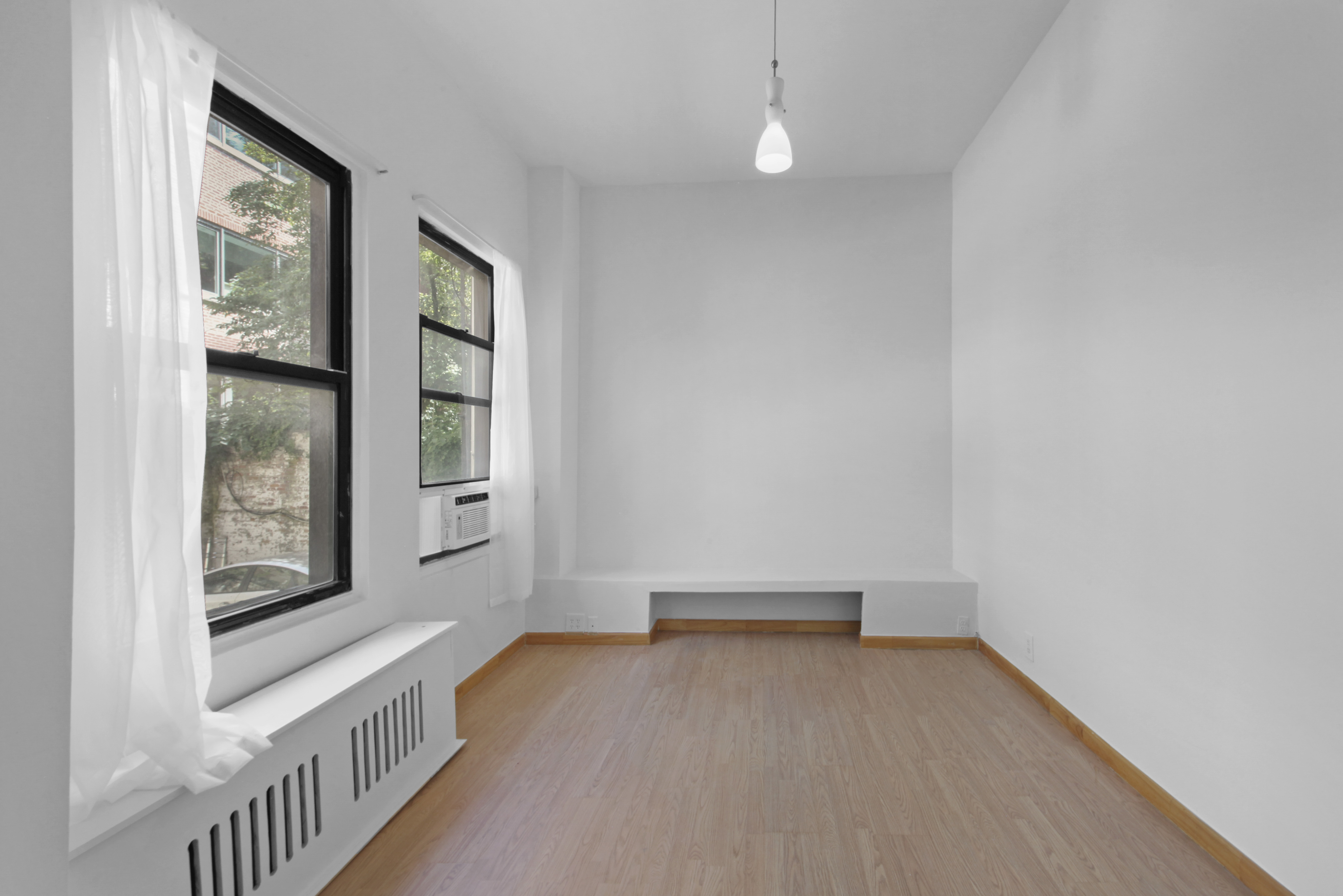 155 Hicks Street, Unit 2B Brooklyn, NY 11201 - Photo 2 of 11 a view of an empty room with a window