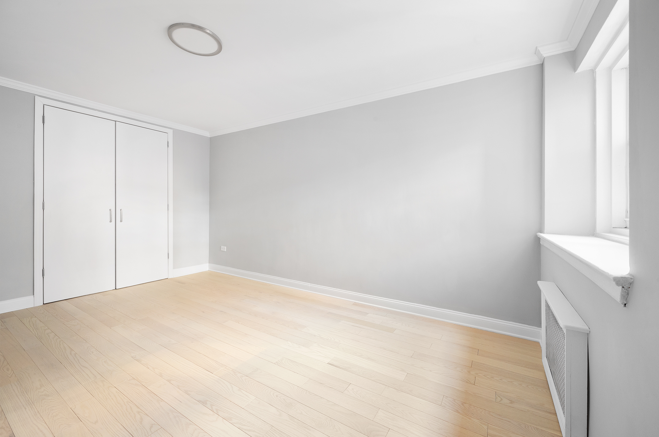 122 Ashland Place, Unit 12L Brooklyn, NY 11201 - Photo 8 of 16 a view of an empty room