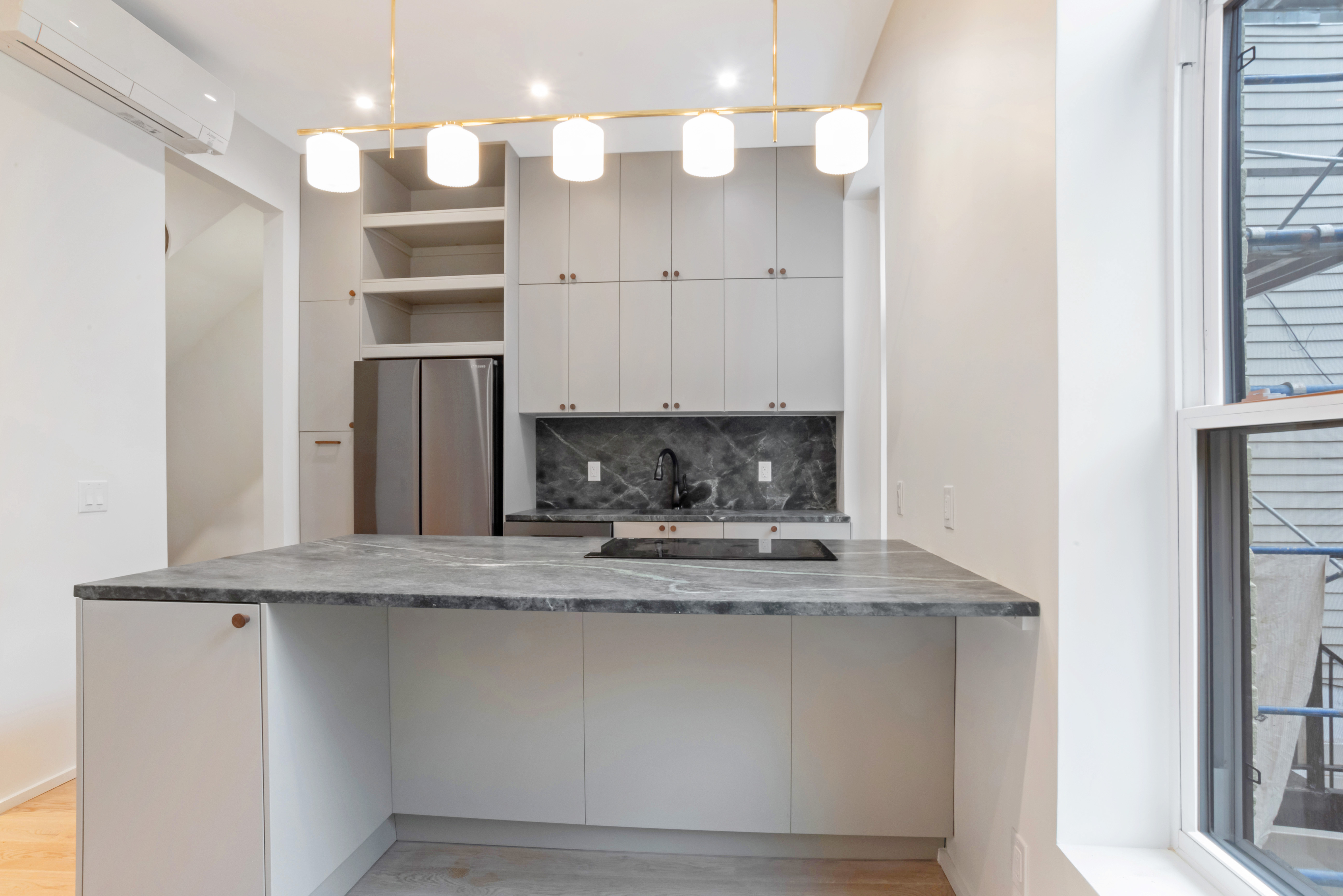 42 Monroe Street, Unit 2 Brooklyn, NY 11238 - Photo 6 of 19 a view of a refrigerator a sink and dishwasher with wooden floor