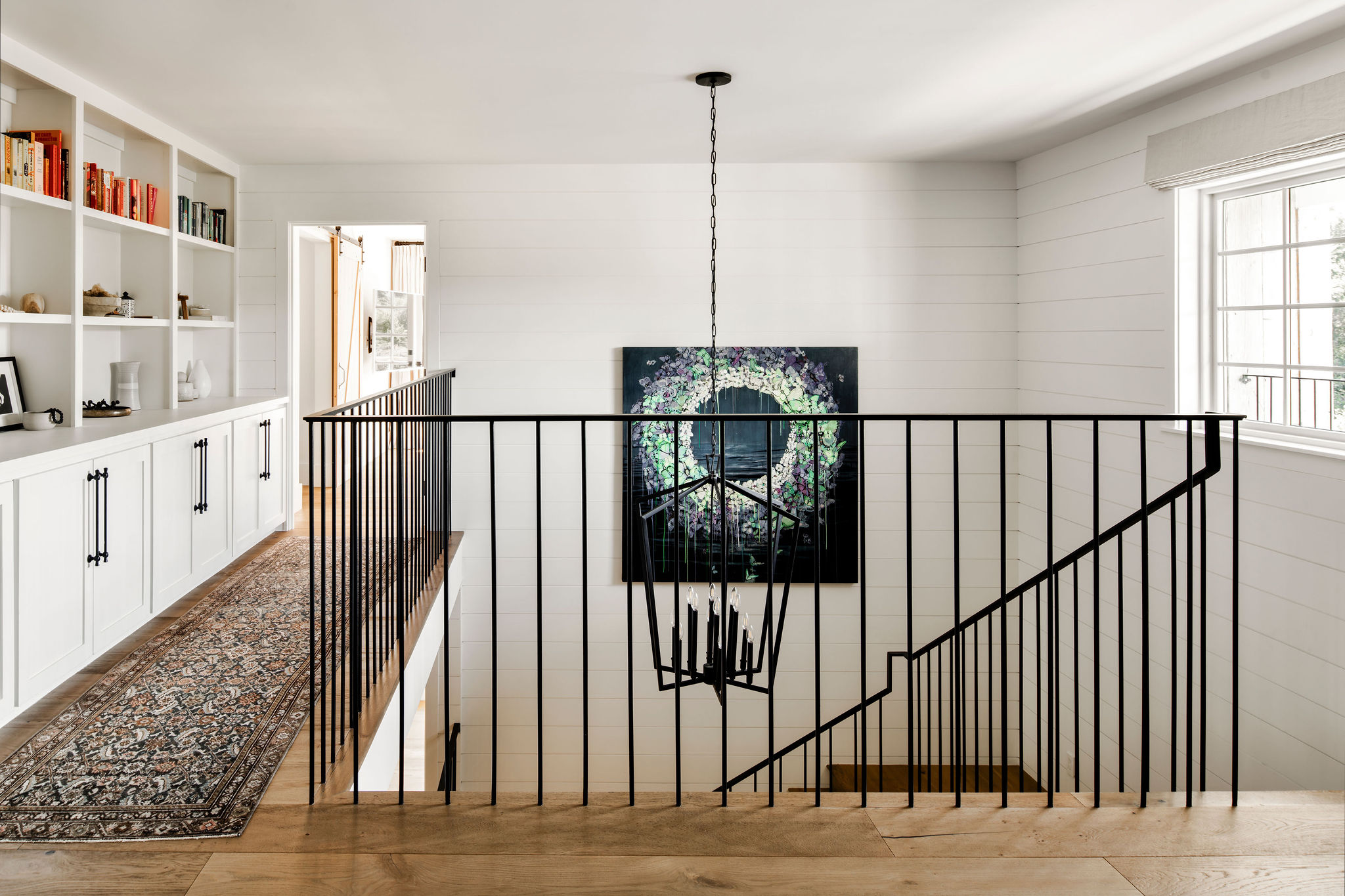 560 Cold Canyon Road Calabasas, CA 91302 - Photo 35 of 84 a view of a hallway with wooden floor and staircase