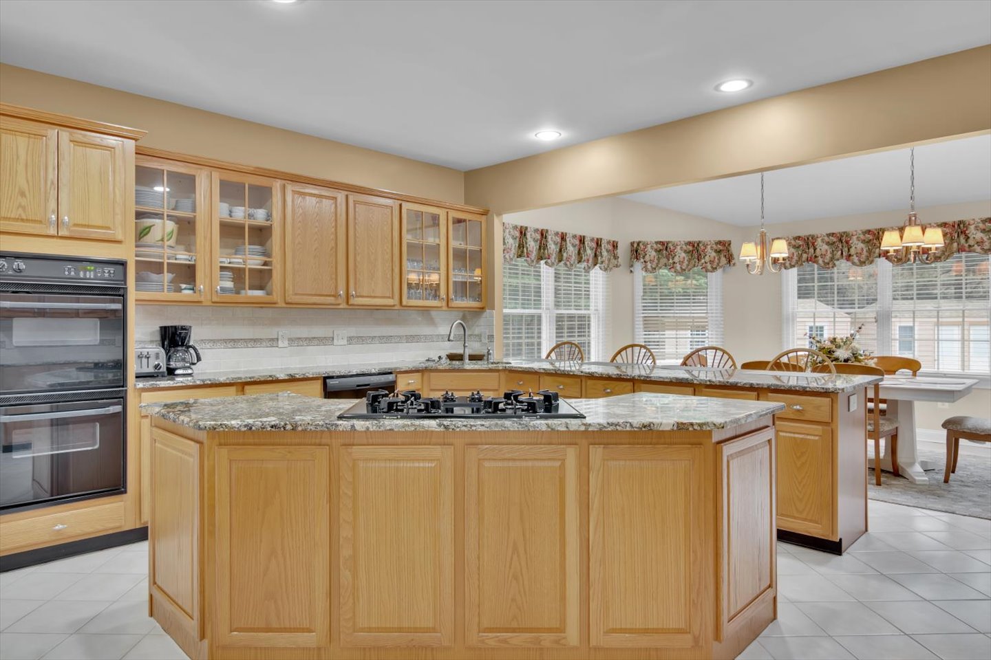 3 Pembroke Drive Voorhees, NJ 08043 - Photo 21 of 112 a kitchen with stainless steel appliances granite countertop a sink and a stove