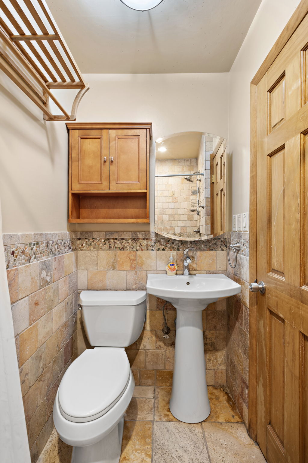 West 43rd Street Bayonne, NJ 07002 - Photo 9 of 22 a bathroom with a sink toilet and shower