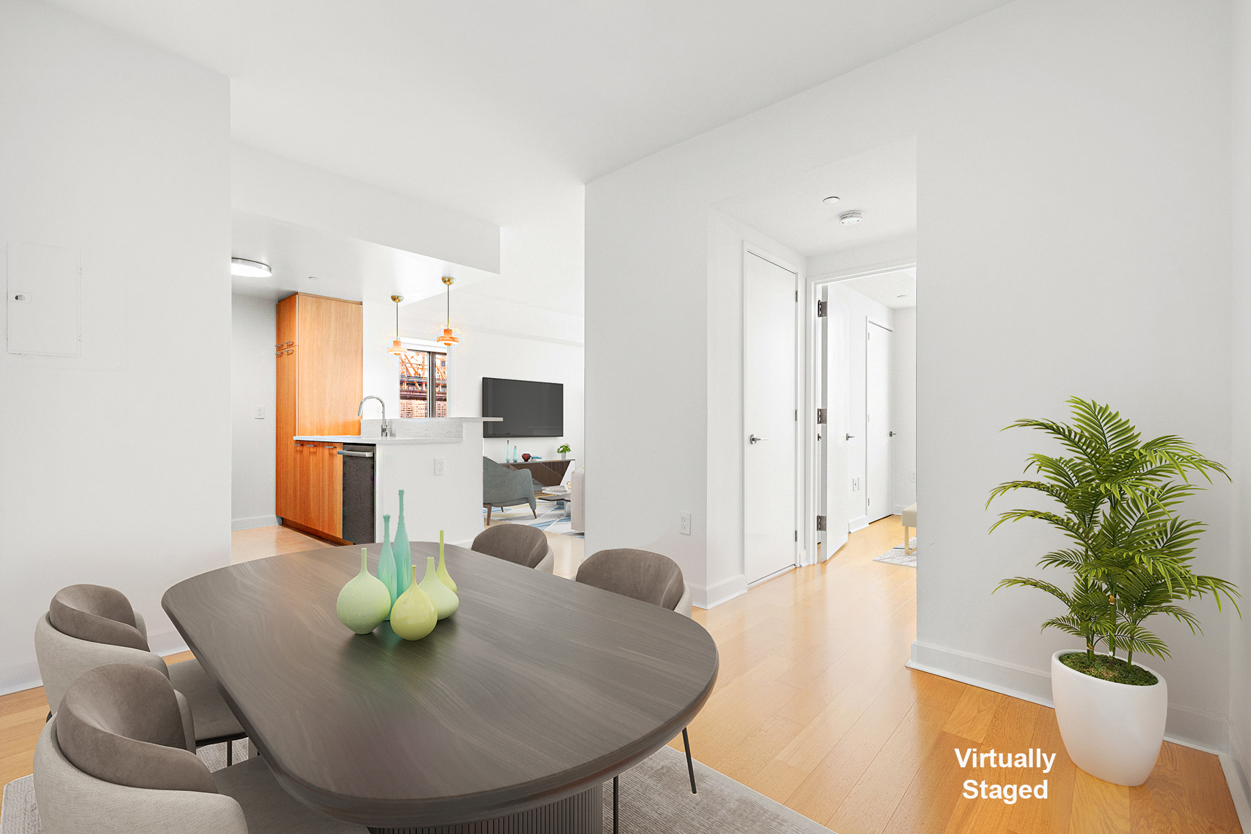 425 Main Street, Unit 9F Manhattan, NY 10044 - Photo 7 of 15 a dining room with furniture and a kitchen view