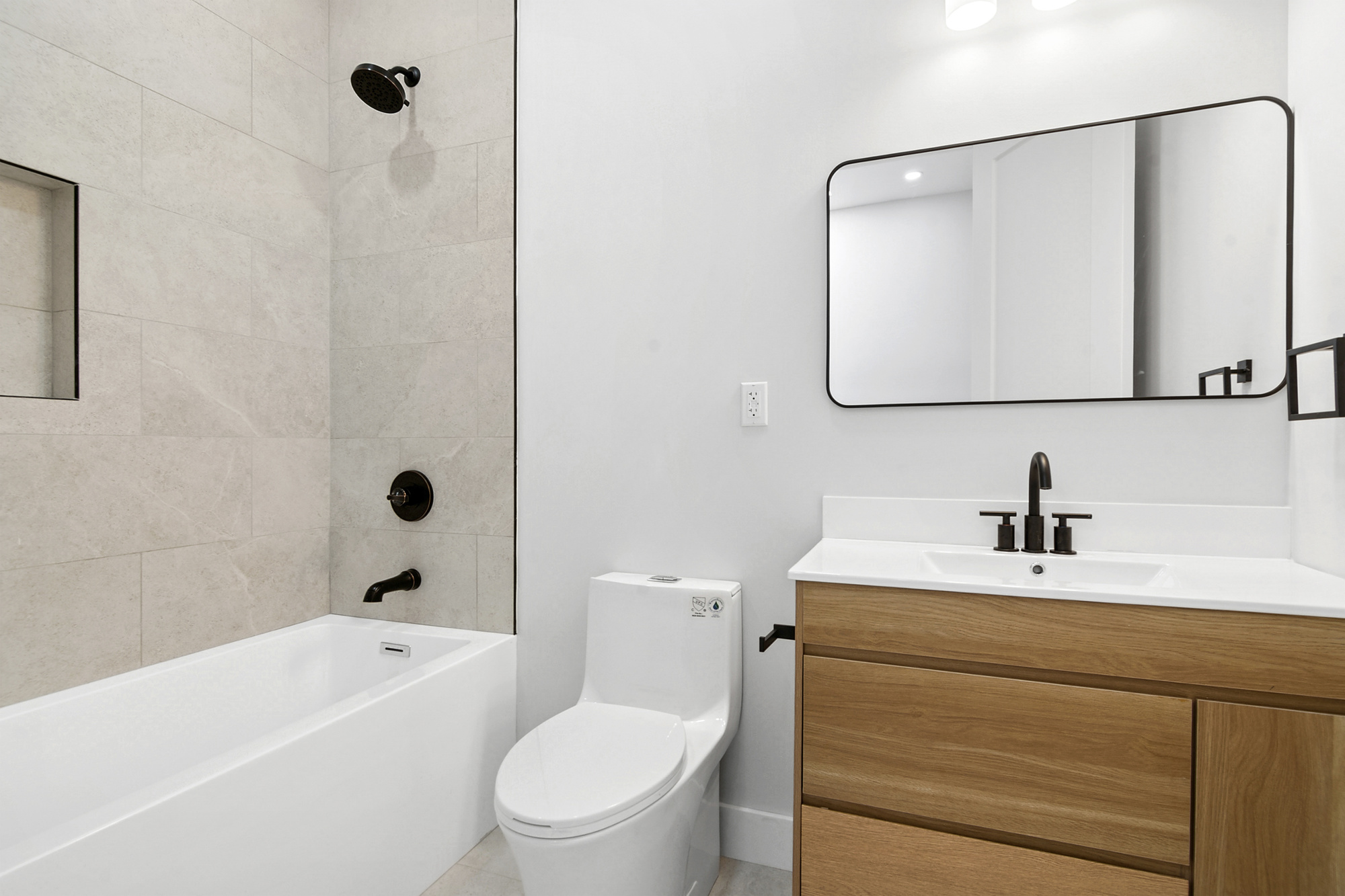 41-05 20th Avenue Queens, NY 11105 - Photo 6 of 20 a bathroom with a sink toilet and shower