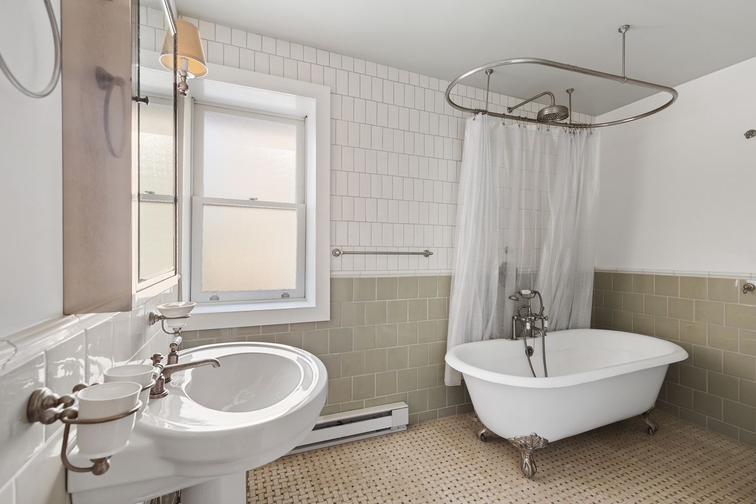 315 Washington Avenue Brooklyn, NY 11205 - Photo 21 of 38 a bathroom with a sink and a mirror