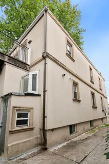 a front view of a house with garage
