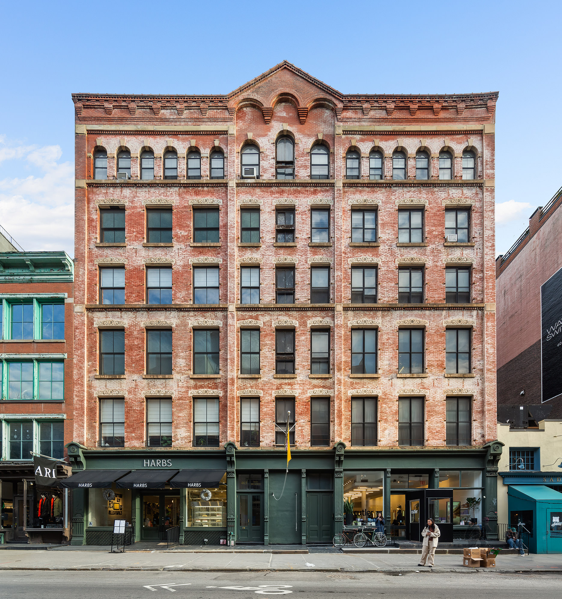 465 West Broadway, Unit 4S Manhattan, NY 10012 - Photo 5 of 7 a front view of a building with street