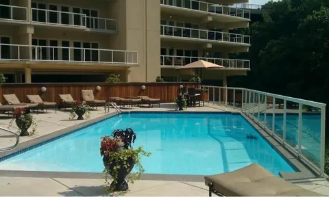 a view of backyard with green space