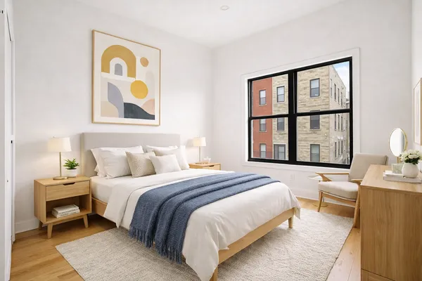 a bedroom with bed and a window