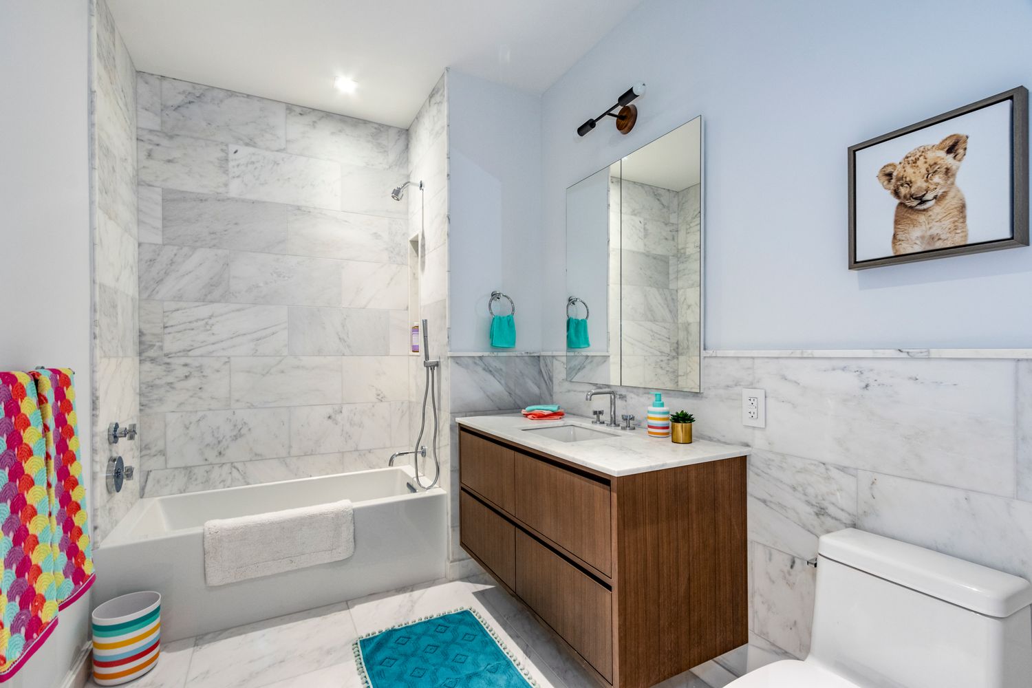106 Franklin Street, Unit 2 Manhattan, NY 10013 - Photo 11 of 16 a bathroom with a sink mirror toilet and bathtub