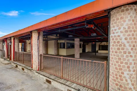a view of car parked in front of house