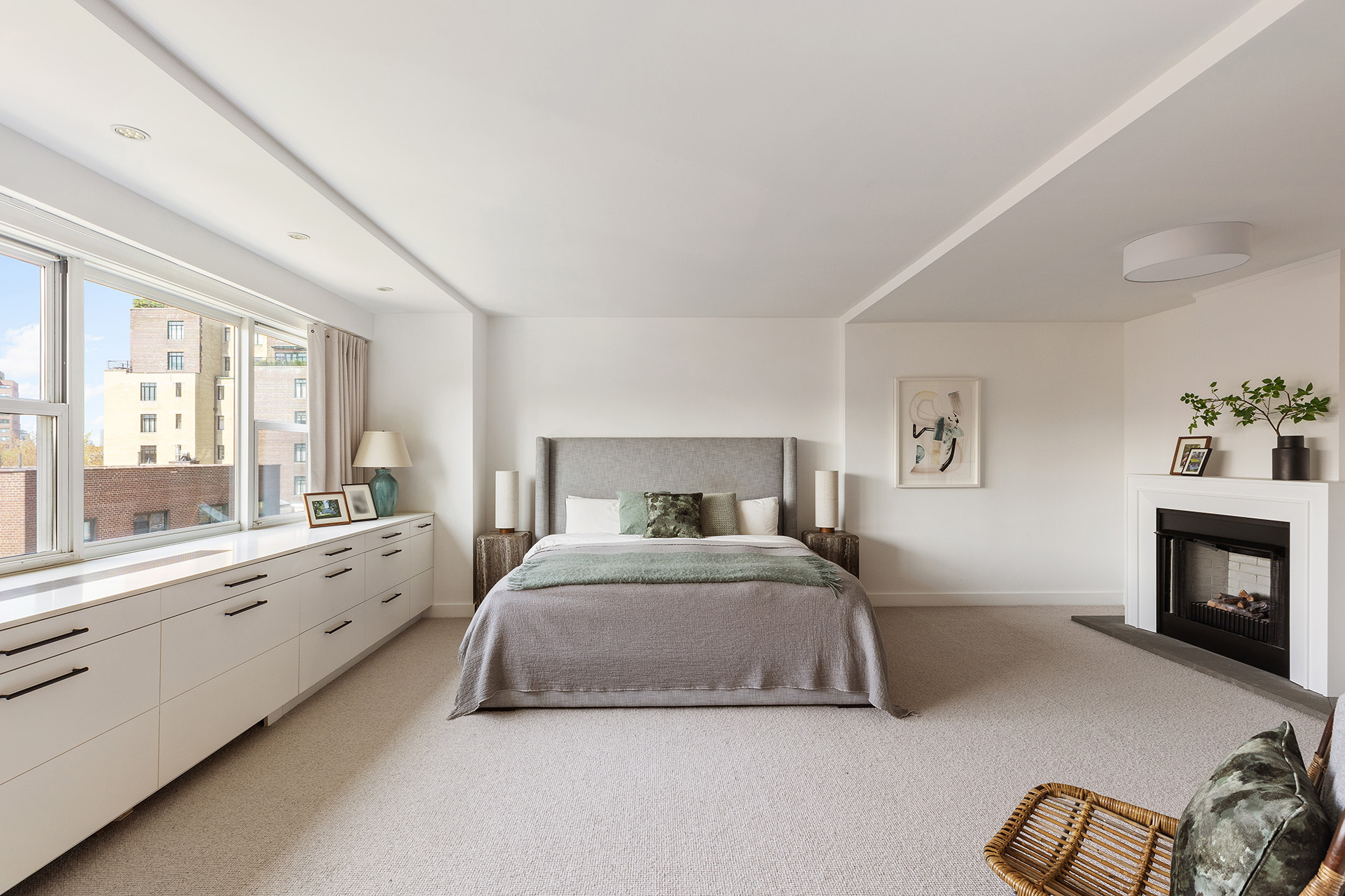 101 West 12th Street, Unit 8RS Manhattan, NY 10011 - Photo 8 of 19 a spacious bedroom with a large bed and a balcony