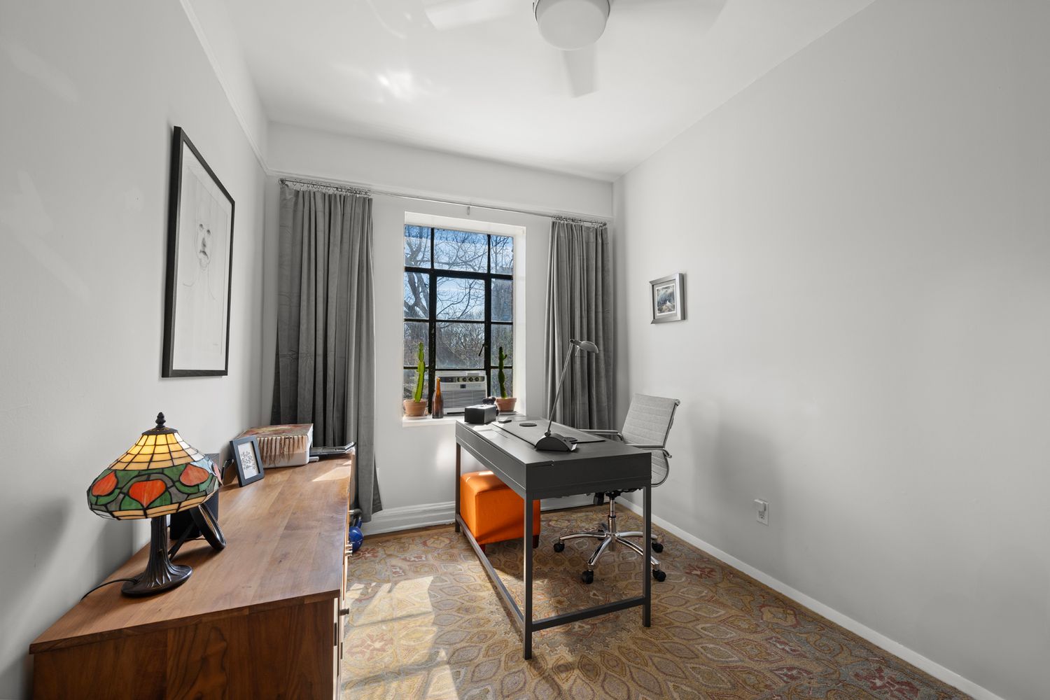 a room with furniture and gym equipment