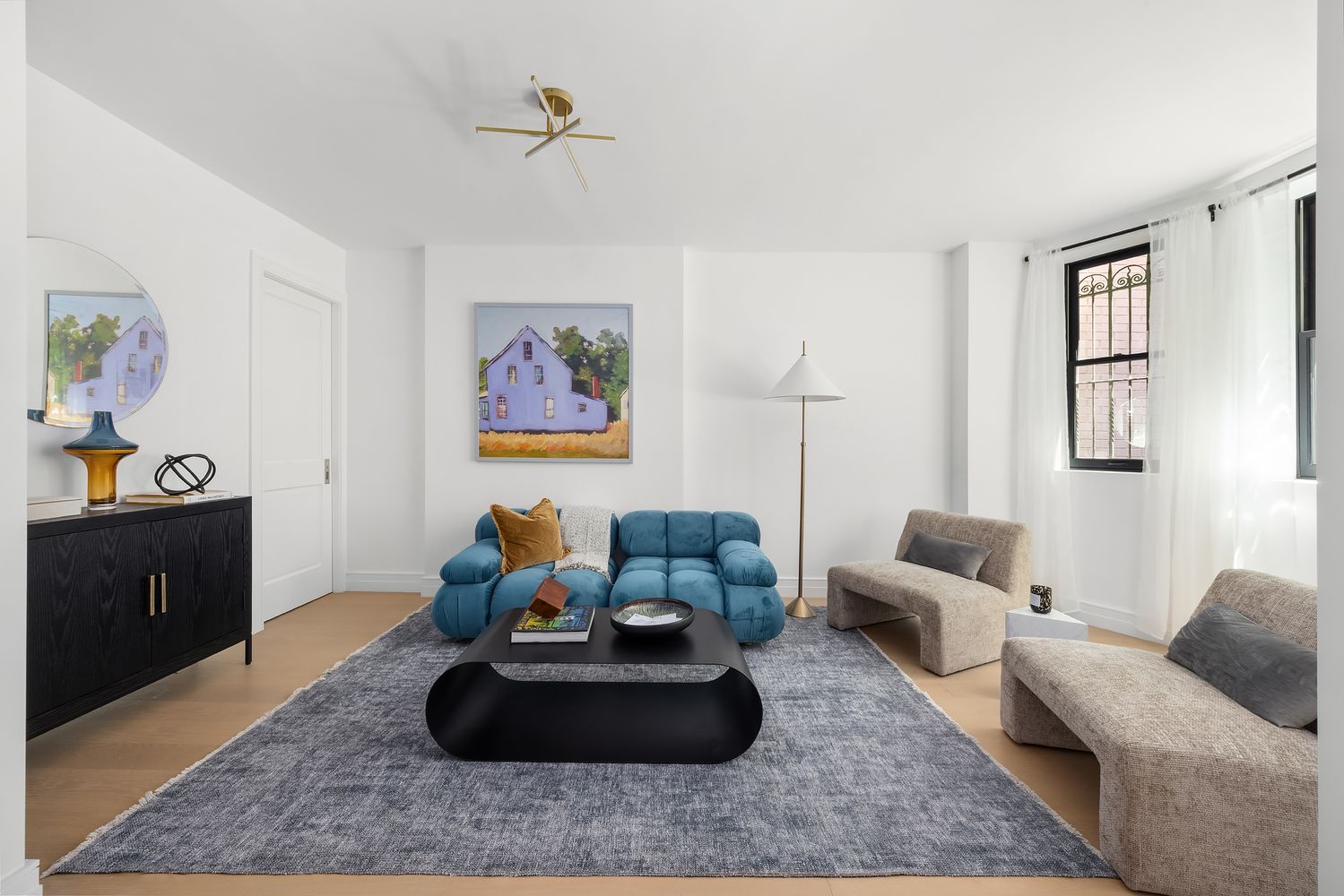 a living room with furniture and a couch