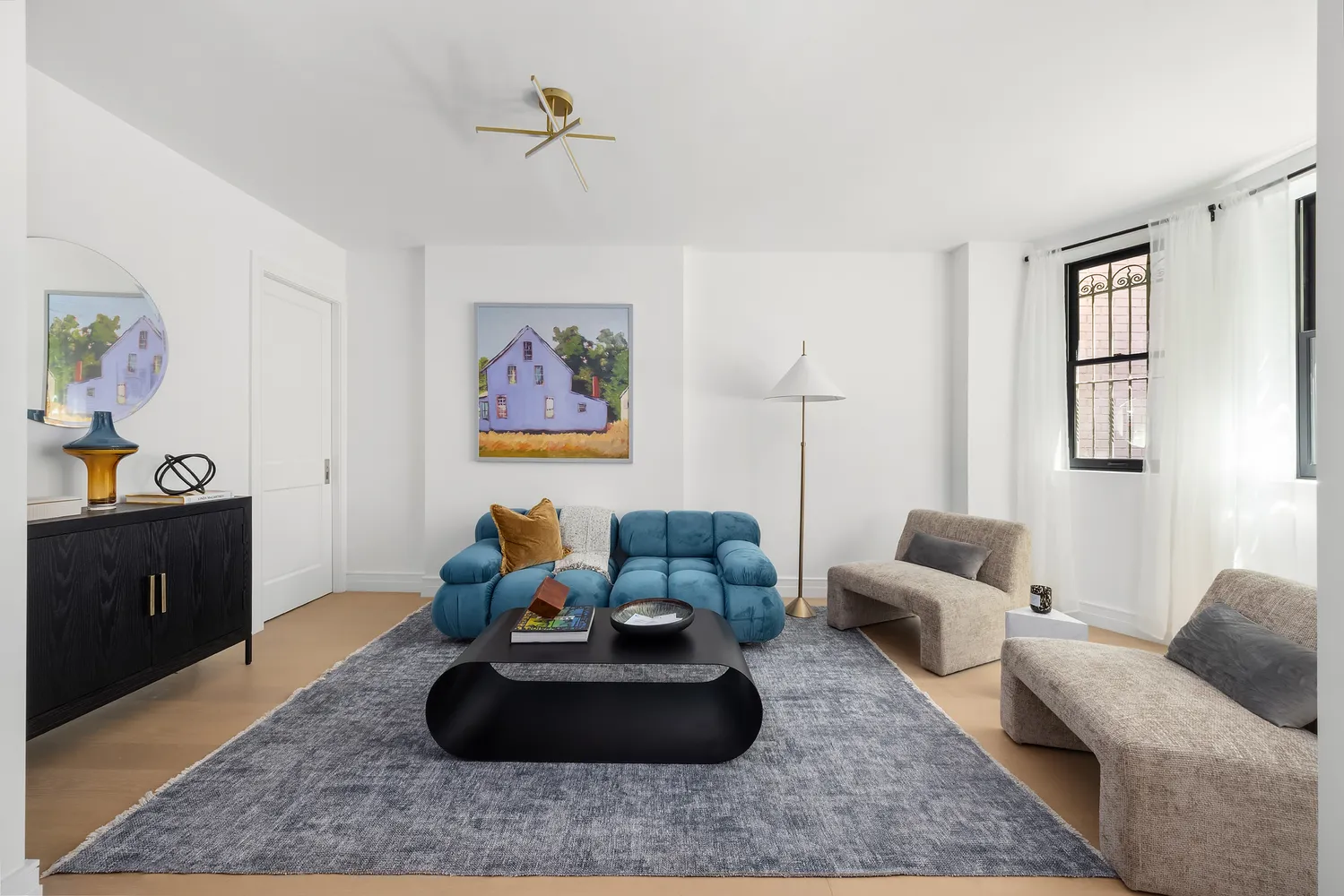 a living room with furniture and a couch