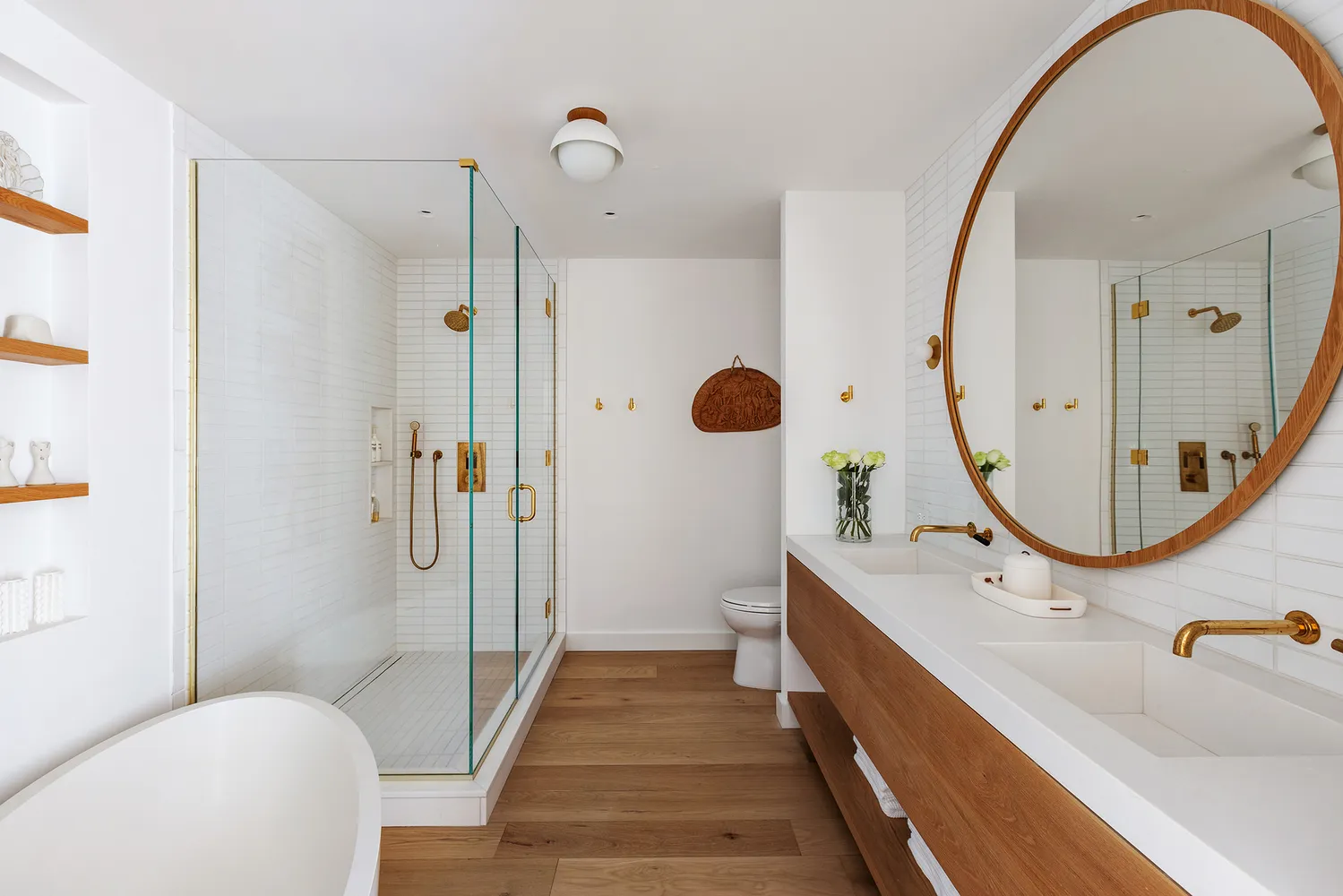 a bathroom with a tub sink and toilet