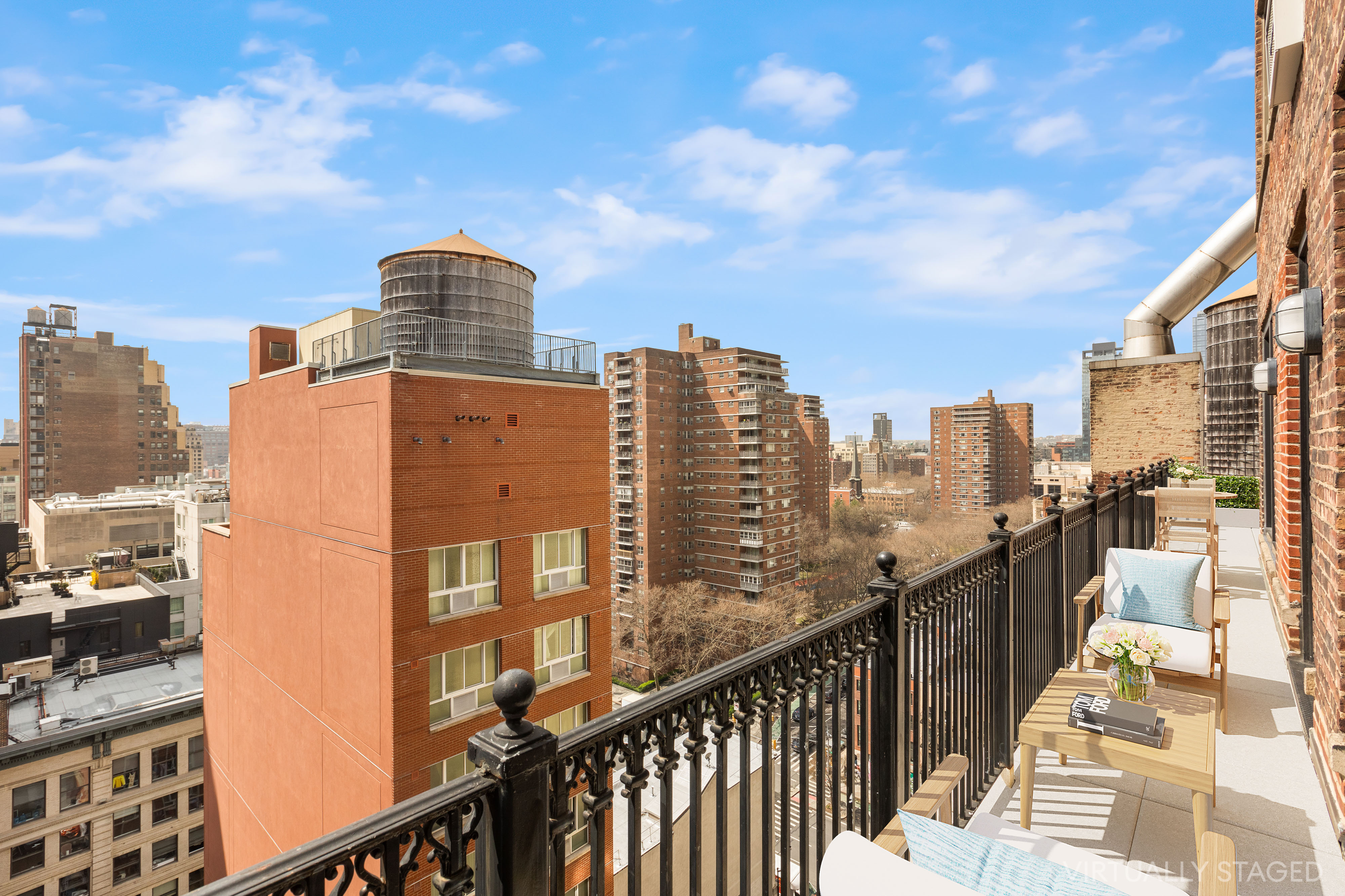 252 West 30th Street, Unit 12 Manhattan, NY 10001 - Photo 4 of 20 a view of a city from a balcony