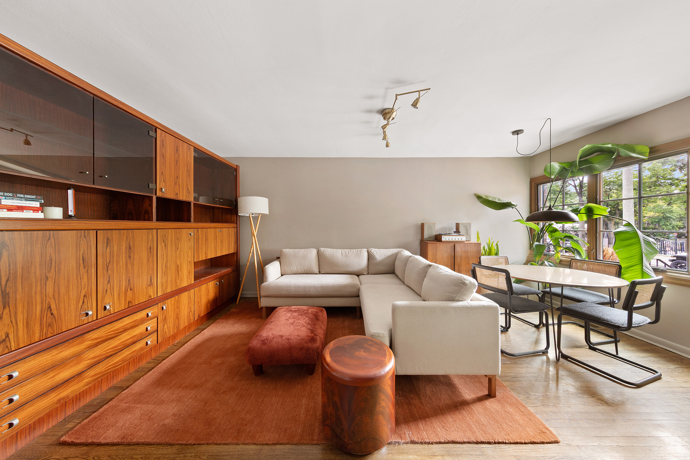 209 Onderdonk Avenue Queens, NY 11385 - Photo 3 of 16 a living room with furniture and a rug