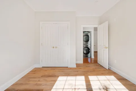 a view of entryway with wooden floor