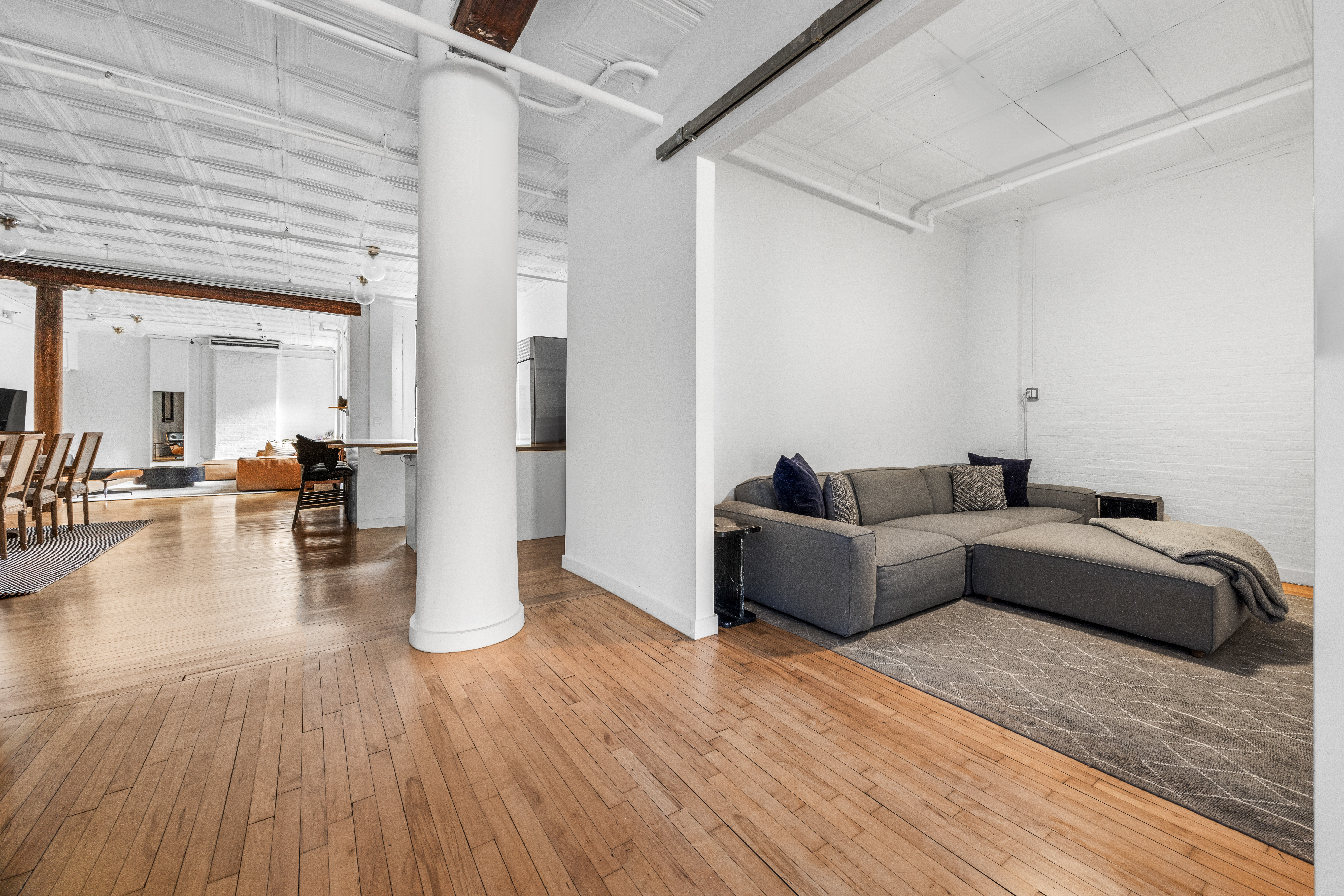 5 White Street, Unit 5B Manhattan, NY 10013 - Photo 10 of 21 a living room with furniture and wooden floor
