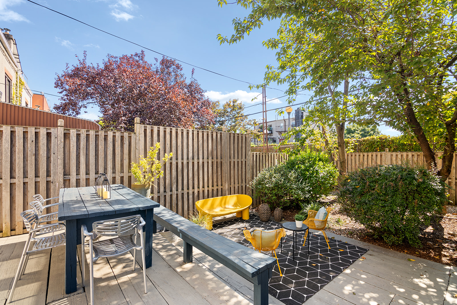 512 17th Street Brooklyn, NY 11215 - Photo 7 of 14 a backyard of a house with table and chairs