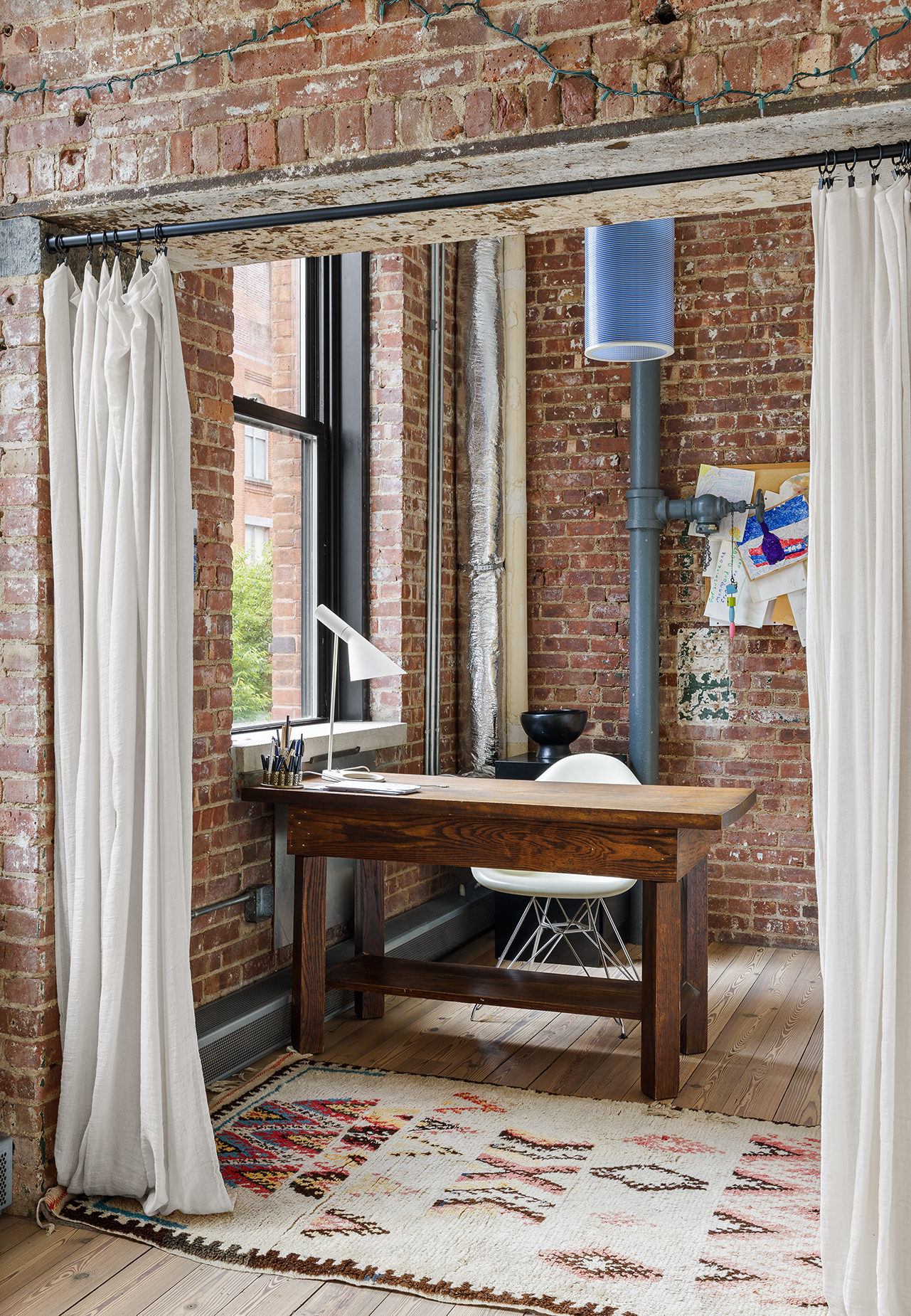 525 West 22nd Street, Unit 3AF Manhattan, NY 10011 - Photo 18 of 25 a table and chair sitting in a balcony