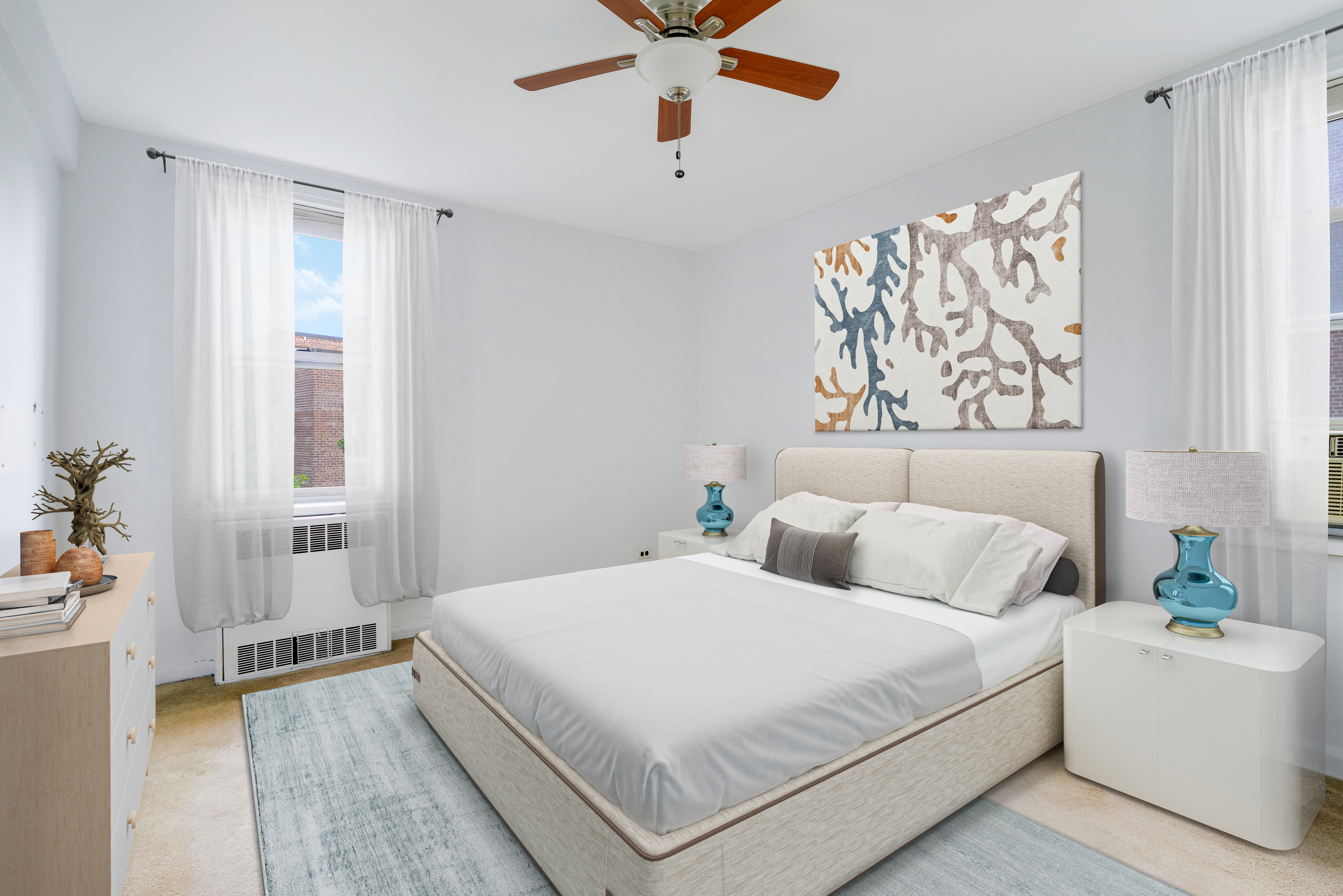 5614 Netherland Avenue, Unit 4E Bronx, NY 10471 - Photo 3 of 8 a bedroom with a bed and a couch