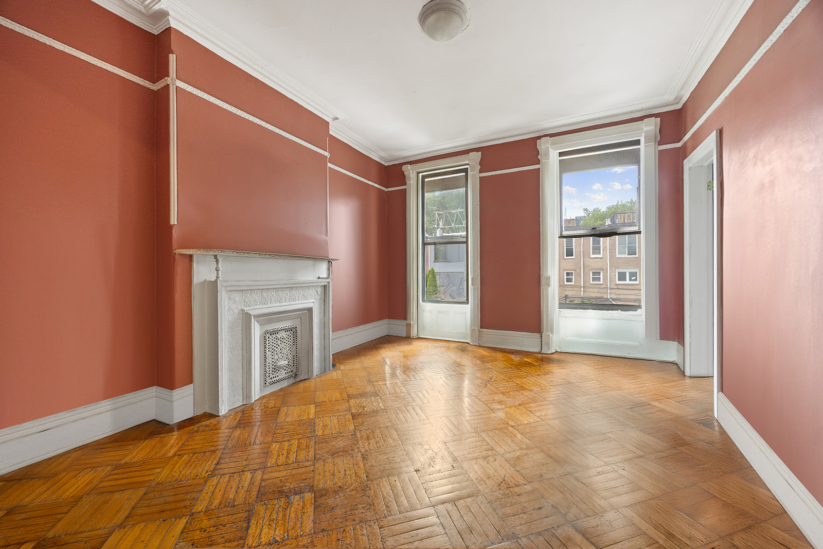 621 Putnam Avenue Brooklyn, NY 11221 - Photo 11 of 19 a view of an empty room with window and fire place
