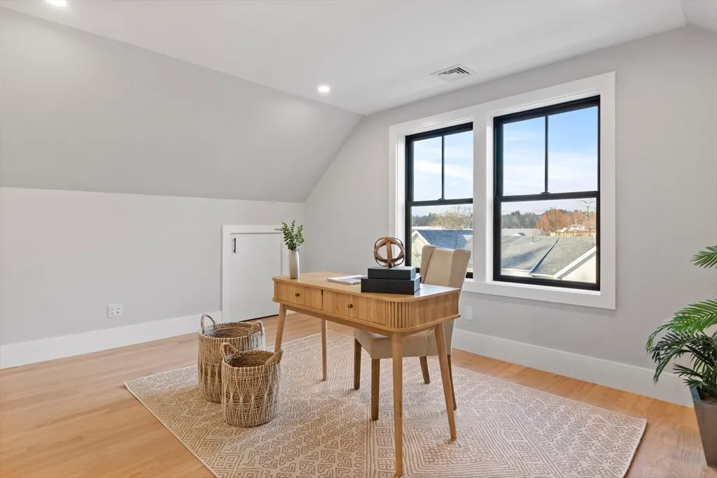 a workspace with furniture and window