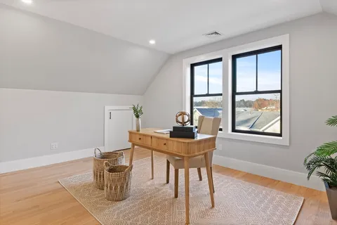 a workspace with furniture and window