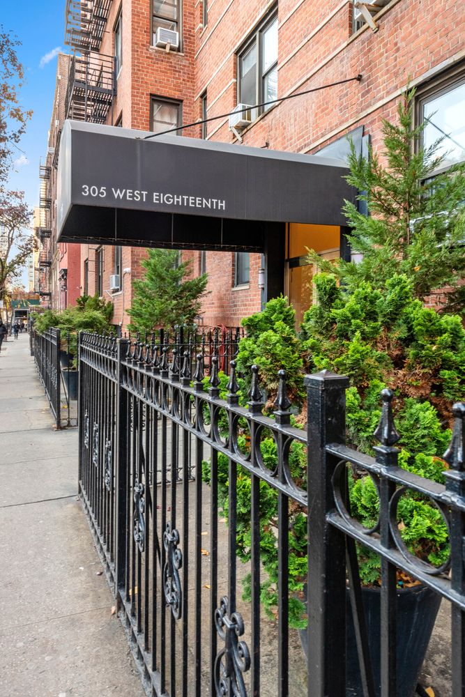 a view of a house with a street