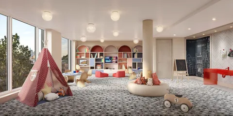 a room with lots of white furniture and a wooden floor