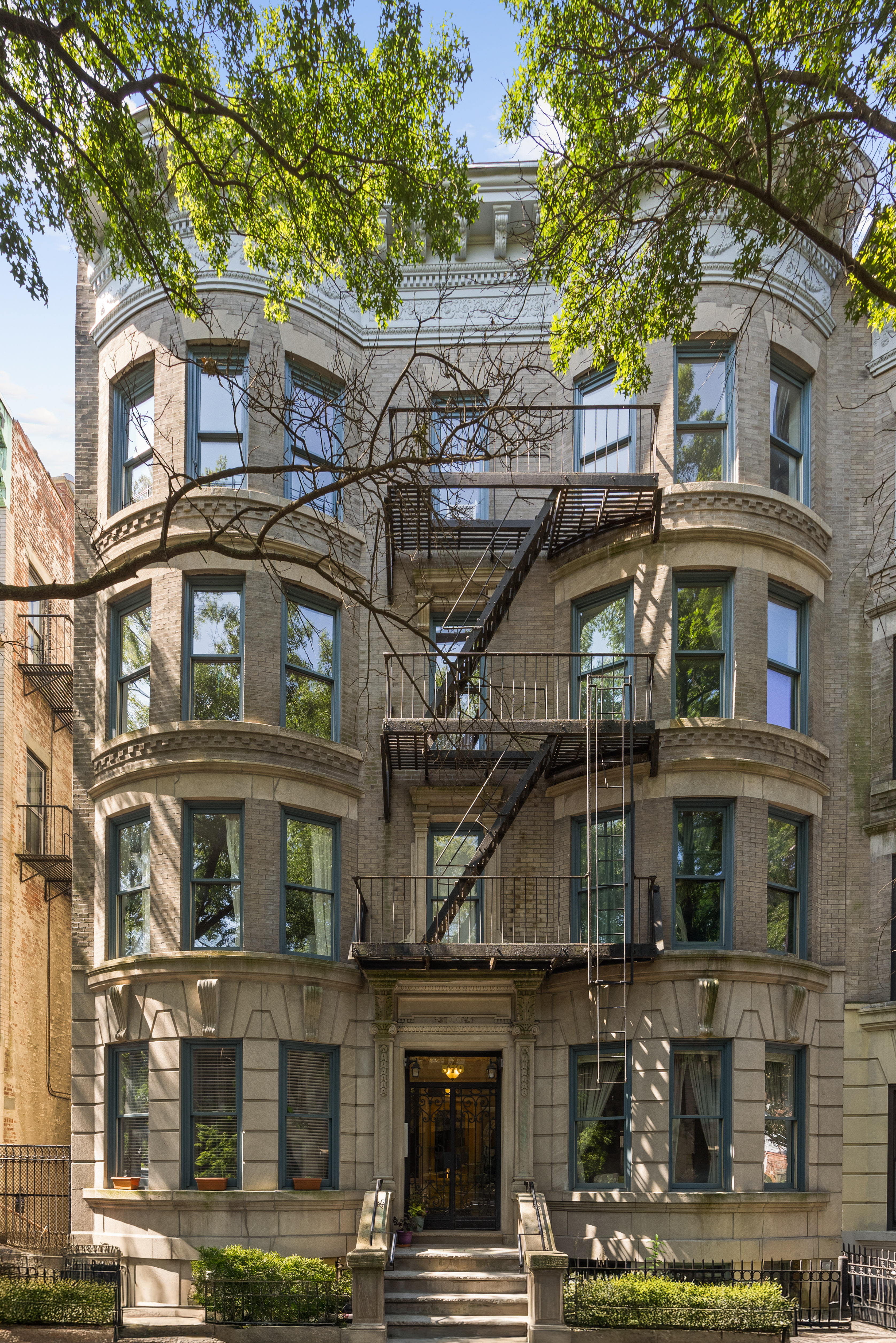 570 7th Street, Unit 3B Brooklyn, NY 11215 - Photo 8 of 9 a front view of a building with a tree