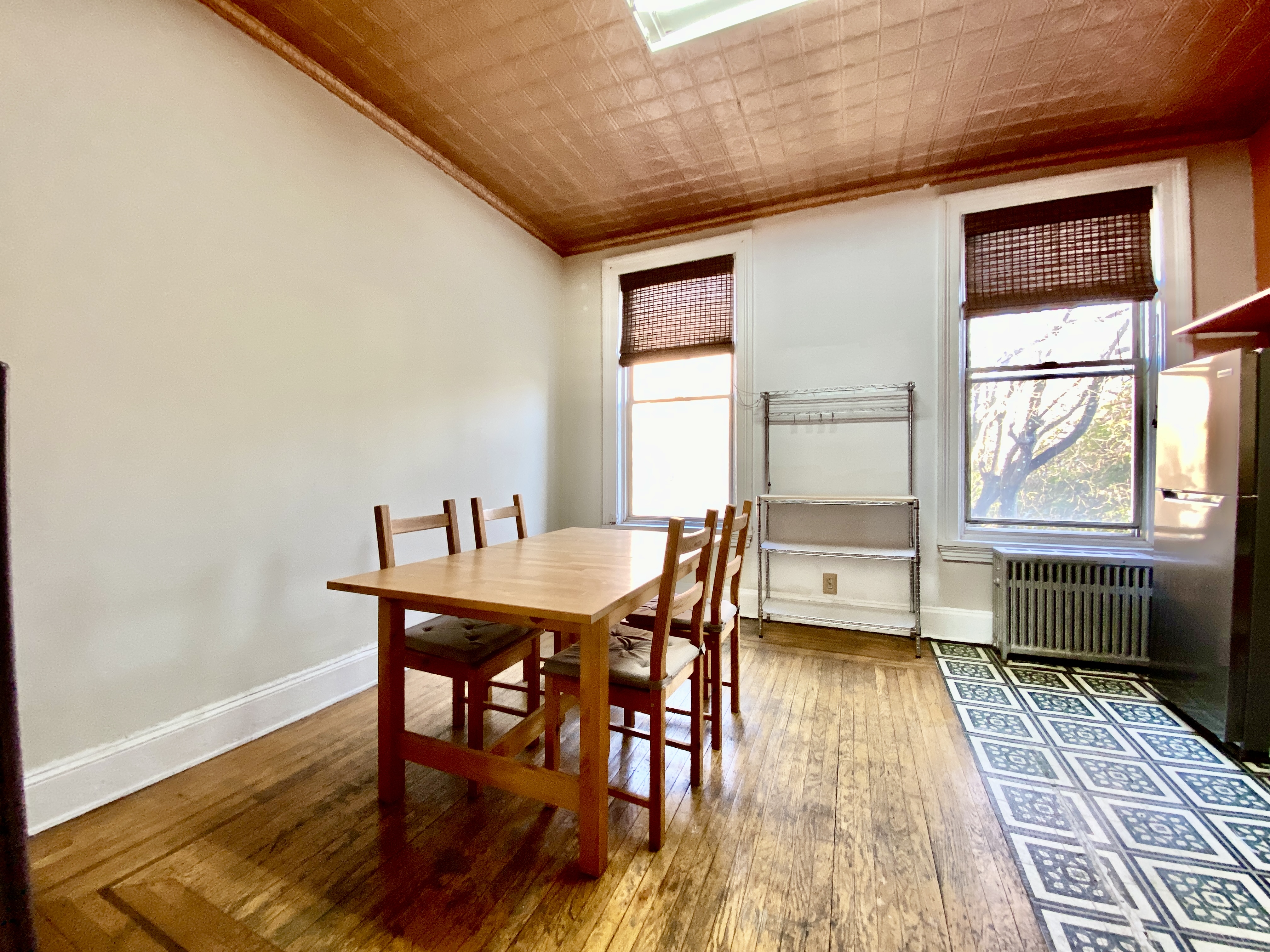 699 4th Avenue, Unit 3 Brooklyn, NY 11232 - Photo 6 of 8 a dining room with furniture and wooden floor