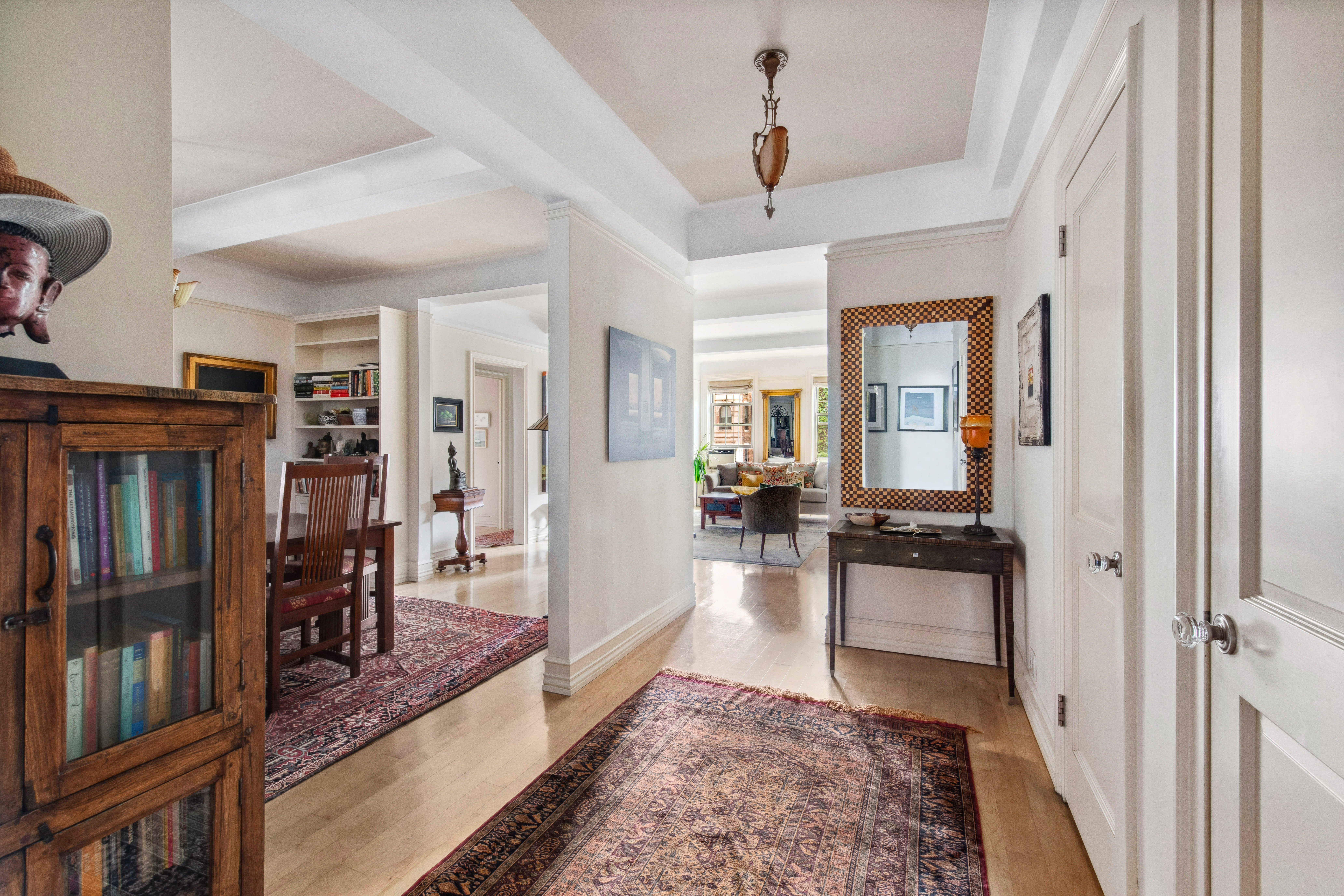 639 West End Avenue, Unit 5B Manhattan, NY 10025 - Photo 8 of 16 a living room with furniture and a wooden floor