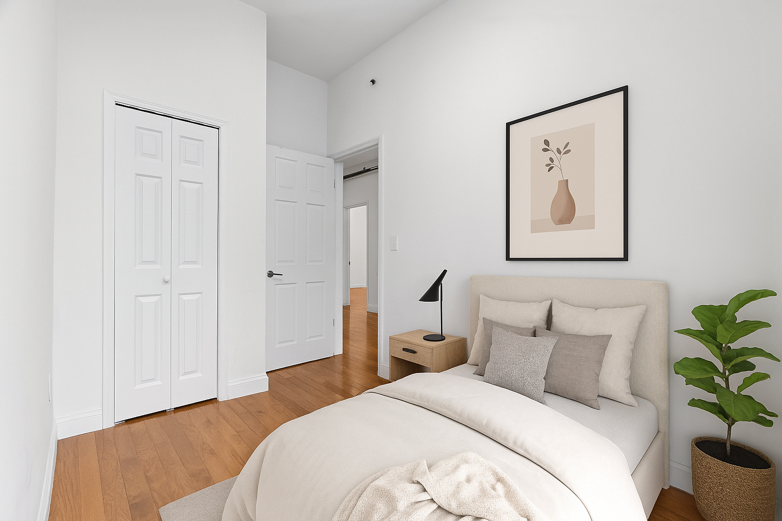 31 St Marks Place, Unit 1 Manhattan, NY 10003 - Photo 5 of 11 a bedroom with a bed and a painting on the wall