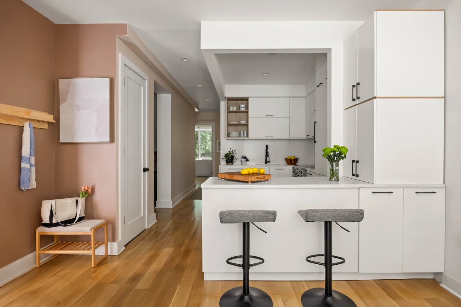 a view of kitchen with furniture and wooden floor