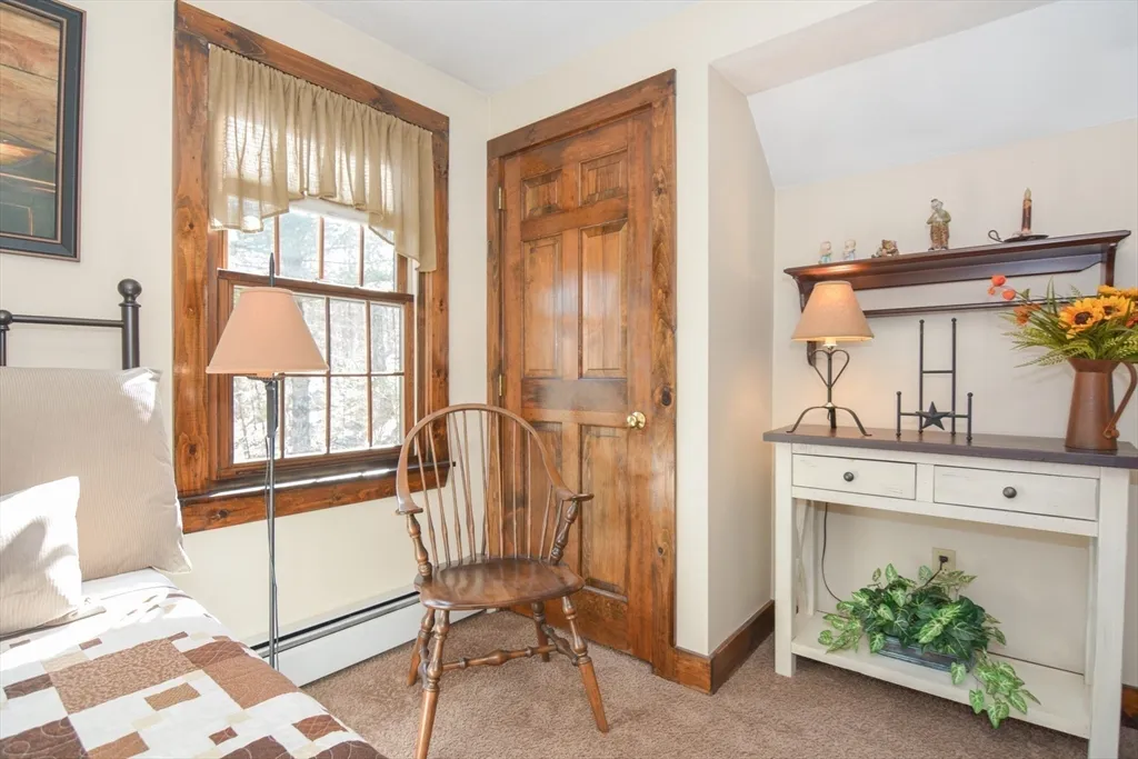a view of a livingroom with furniture and windows