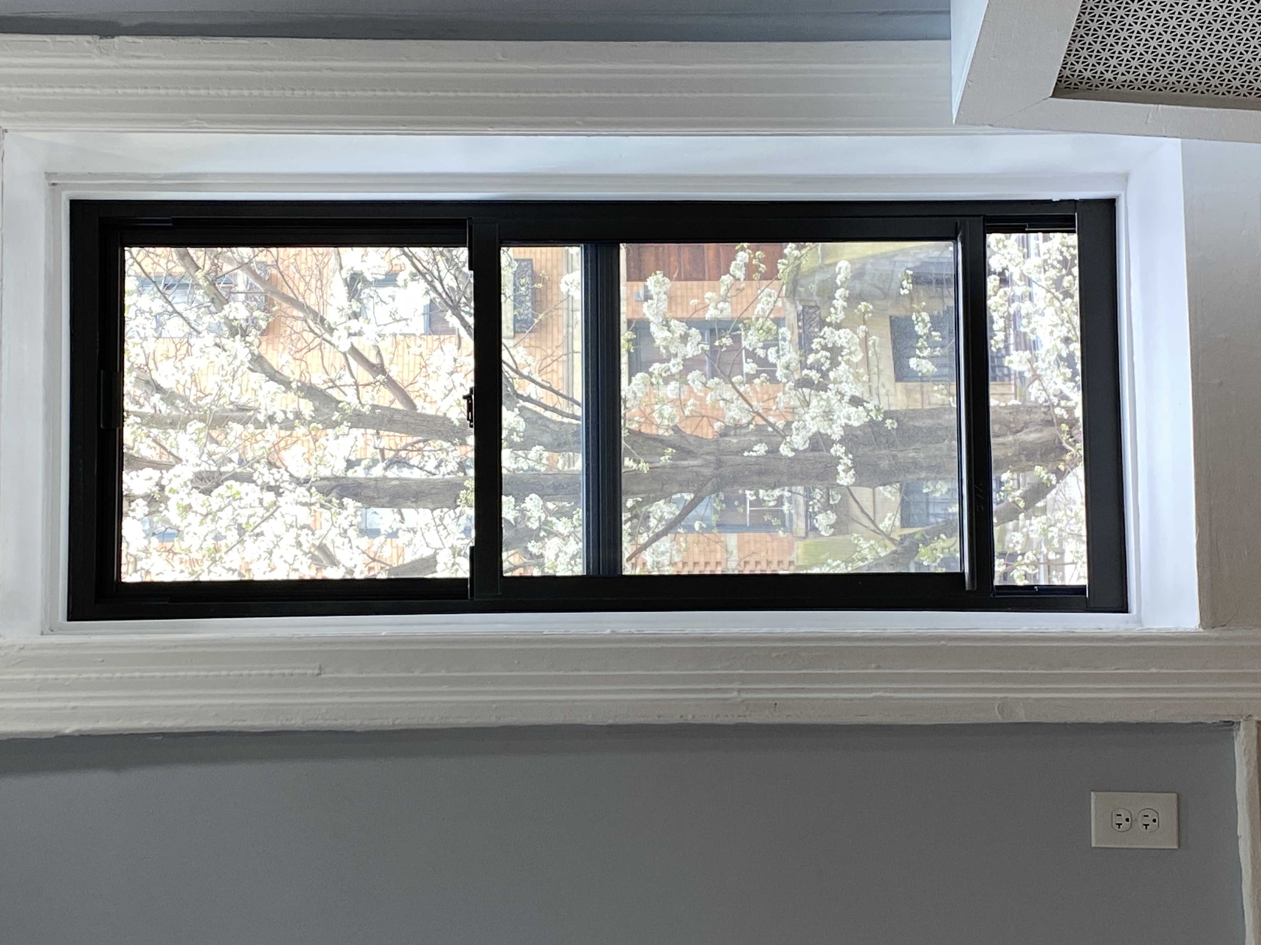 100 Hamilton Place, Unit 2F Manhattan, NY 10031 - Photo 15 of 21 a view of a room that has a large window