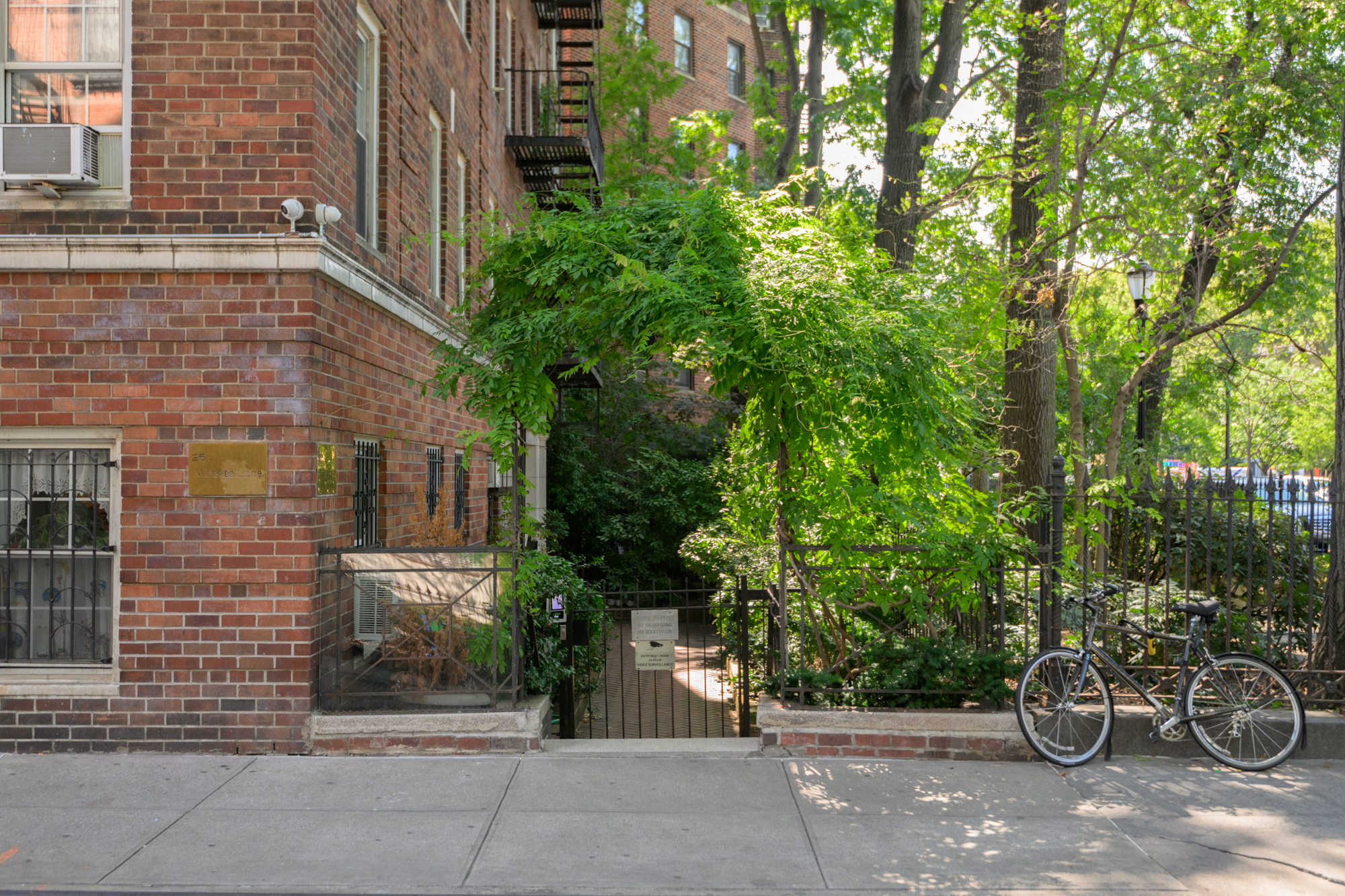 25 Minetta Lane, Unit 6G Manhattan, NY 10012 - Photo 11 of 13 a couple of table and chairs and potted plants