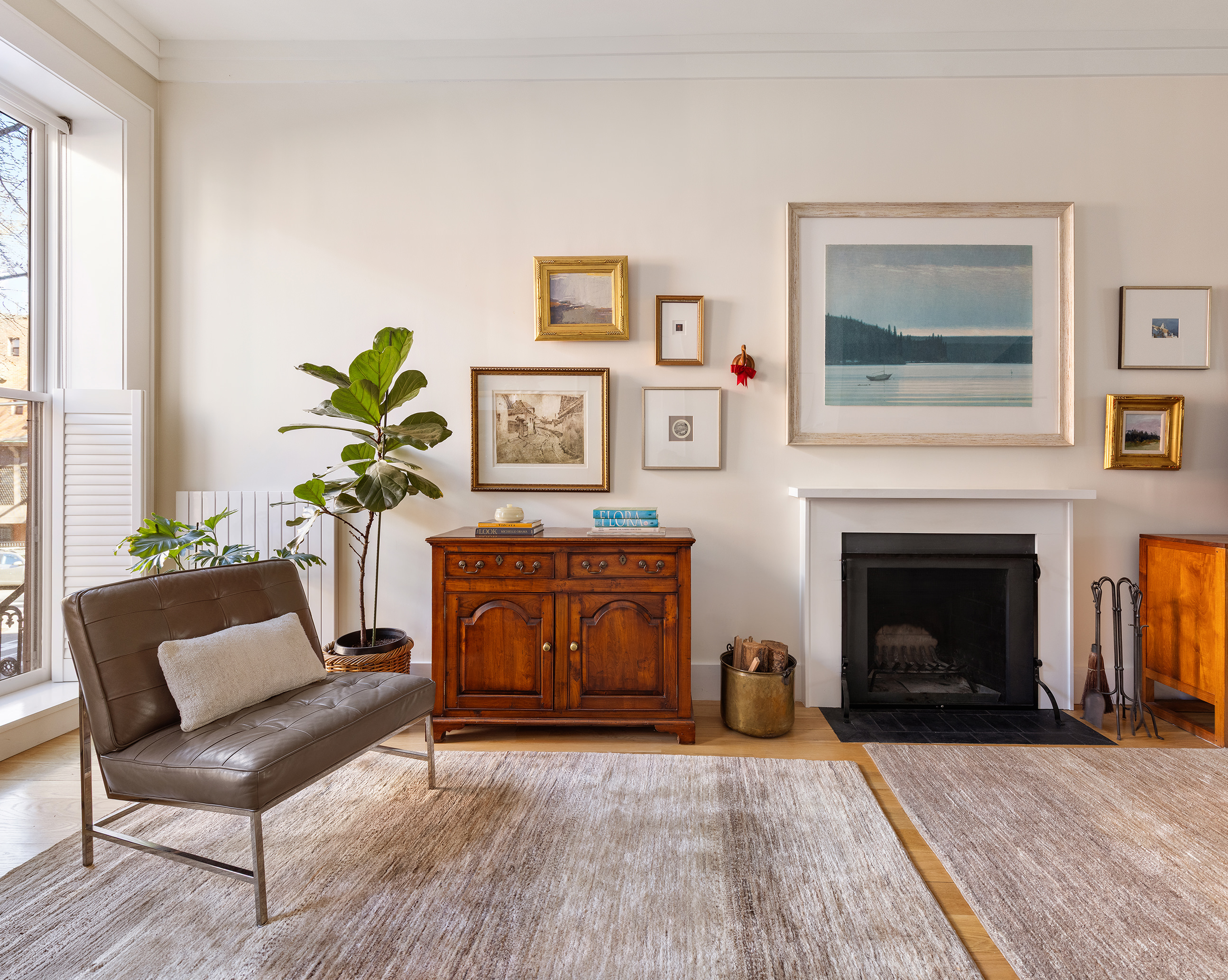 429 Clinton Street, Unit 1 Brooklyn, NY 11231 - Photo 3 of 21 a living room with furniture and a fireplace