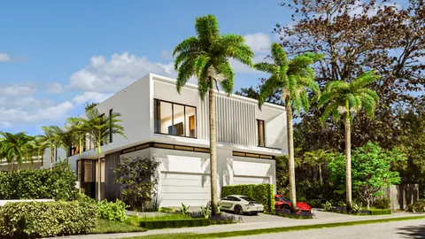 a view of multi story residential apartment building with a yard and entertaining space